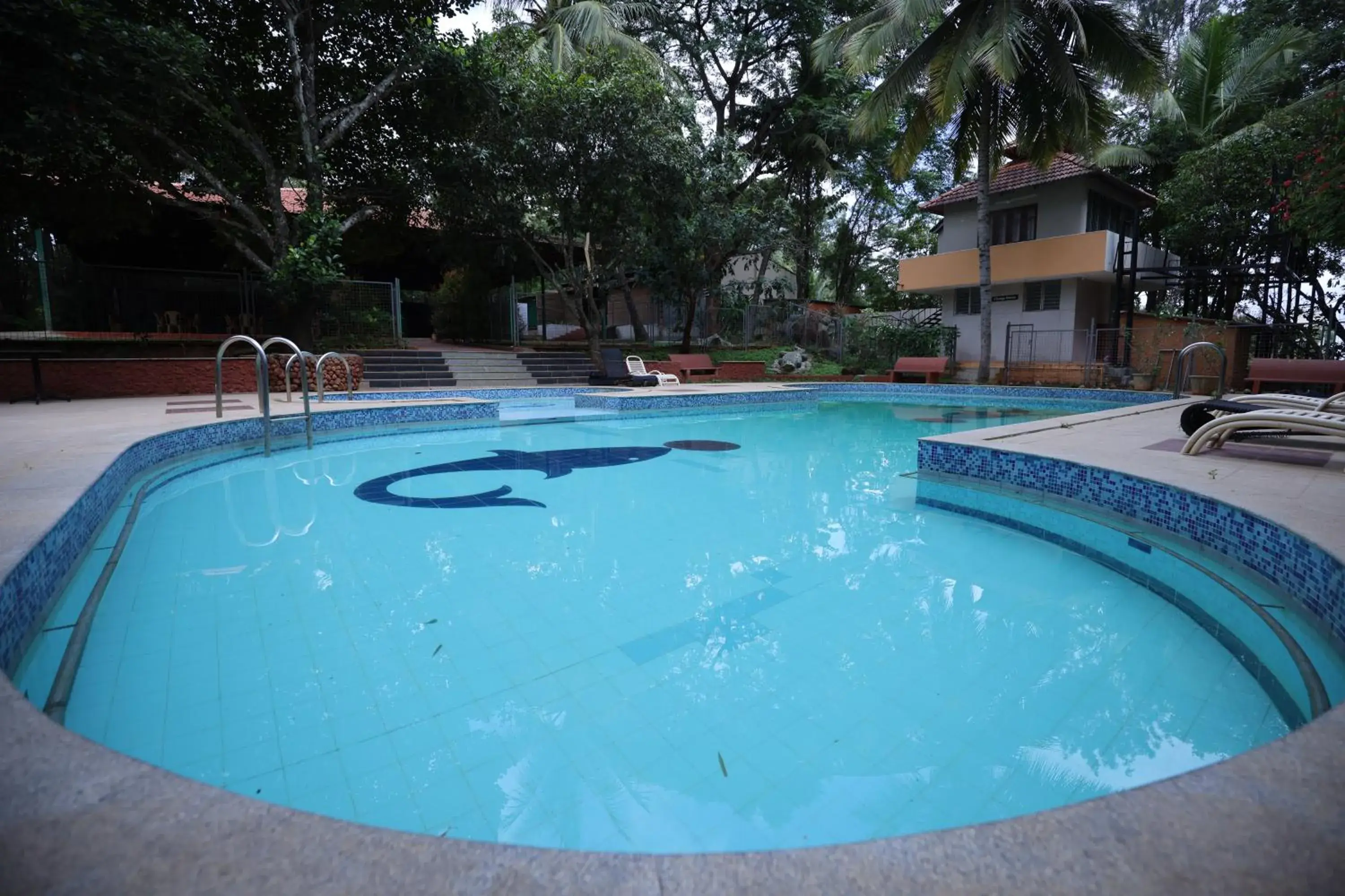 Swimming pool in Nisarga Resort Swimming pool in Nisarga Resort