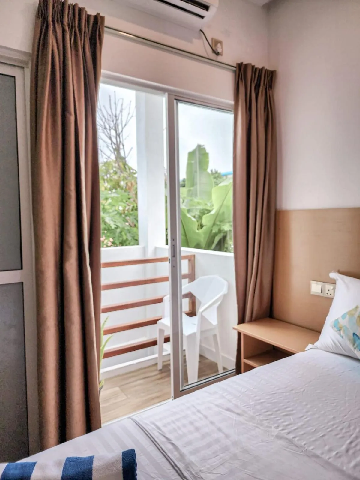 View (from property/room), Bed in Raalhu Fonu Maldives