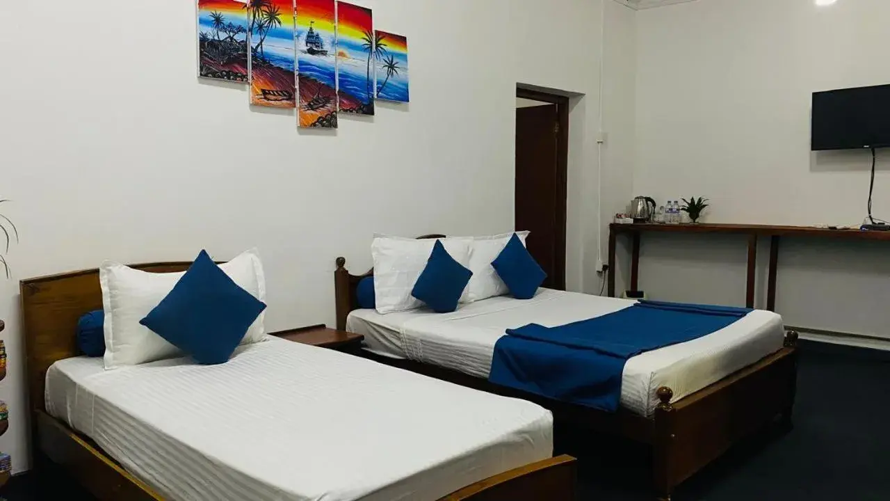 Family Room with Balcony - single occupancy in TEARAMB HOLIDAY BUNGALOW Family Room with Balcony - single occupancy in TEARAMB HOLIDAY BUNGALOW