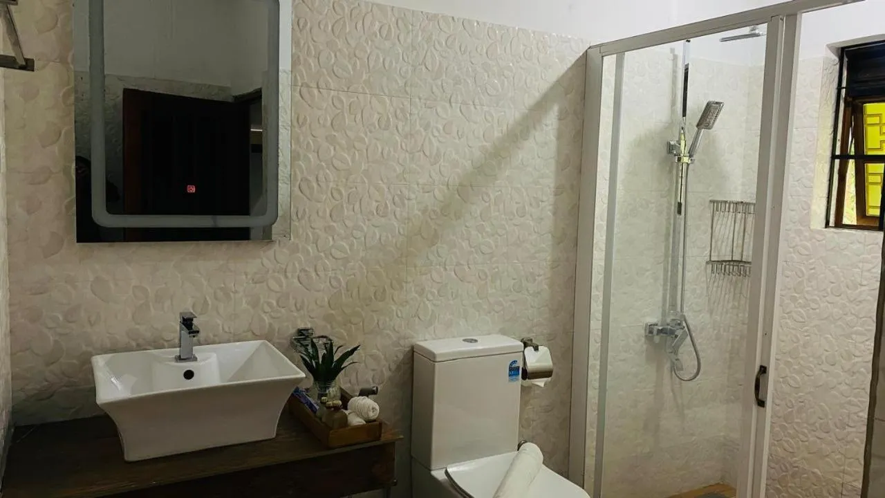 Shower in TEARAMB HOLIDAY BUNGALOW