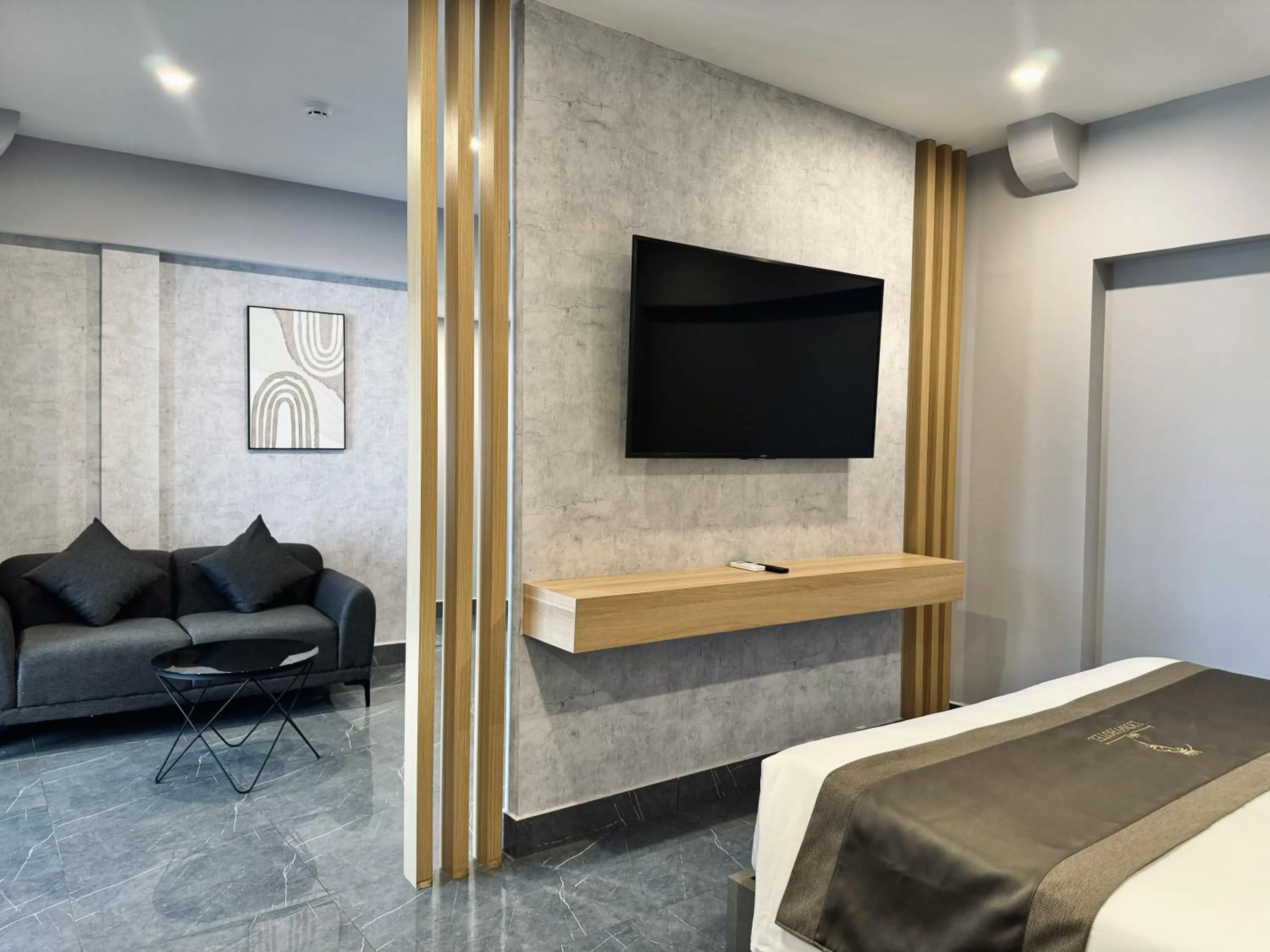 Communal lounge/ TV room, Bed in LION 9 HOTEL