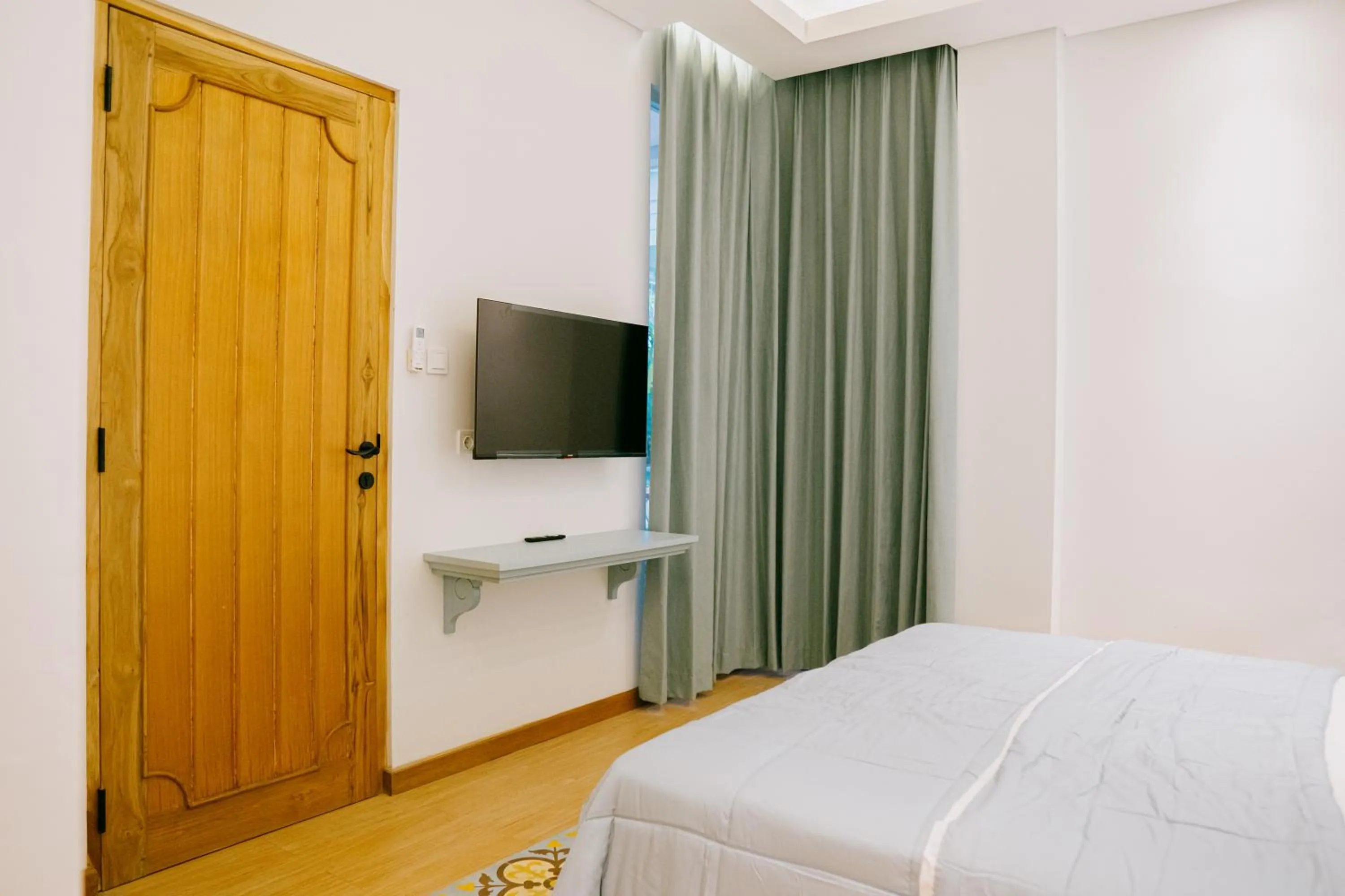 Communal lounge/ TV room, Bed in Casa Amarta Boutique Lofts & Detox