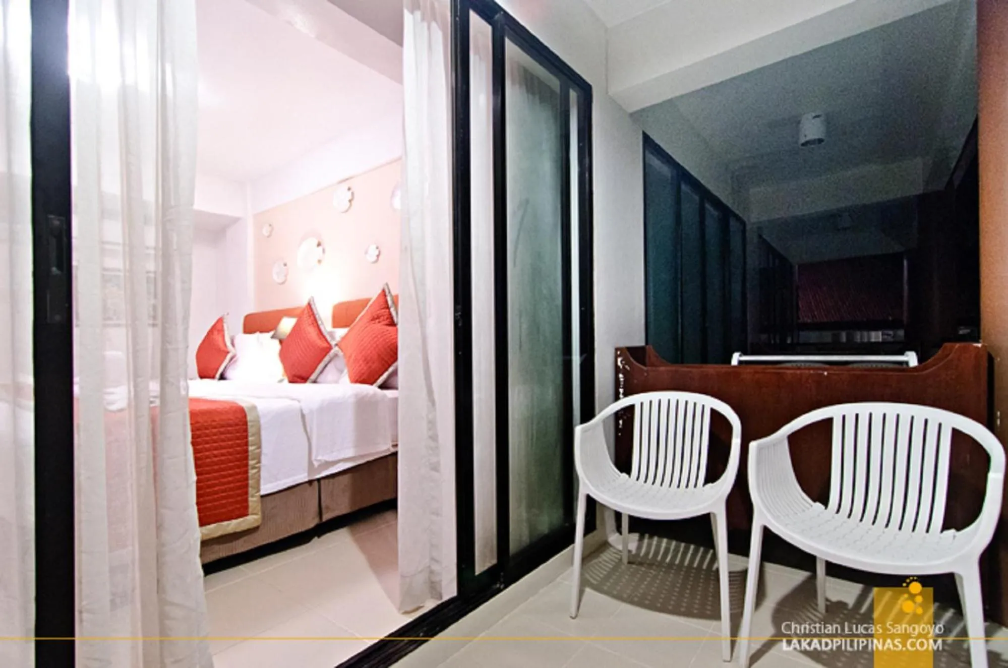 Seating area, Bed in White House Beach Resort