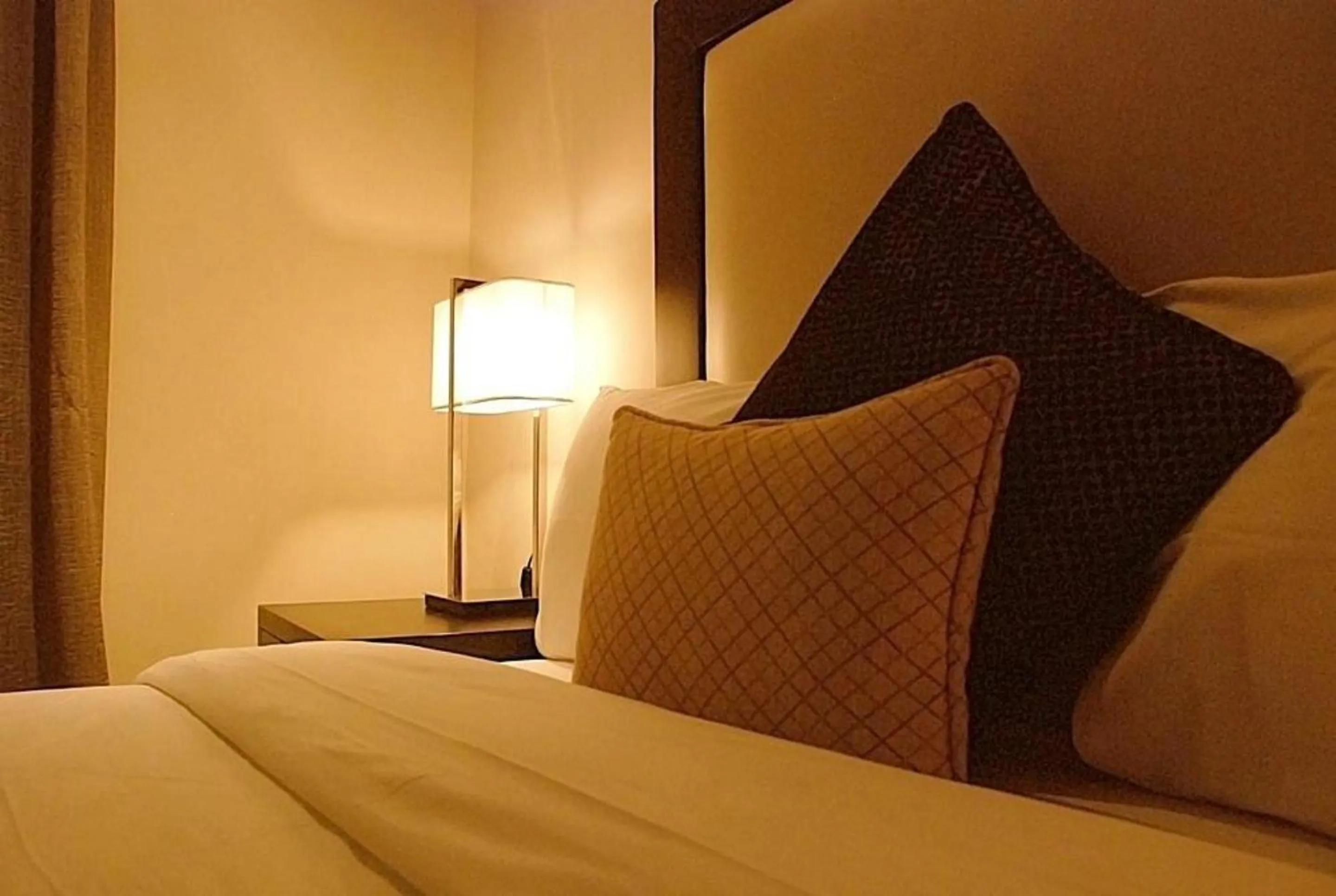 Bed in S & S Hotel & Suites