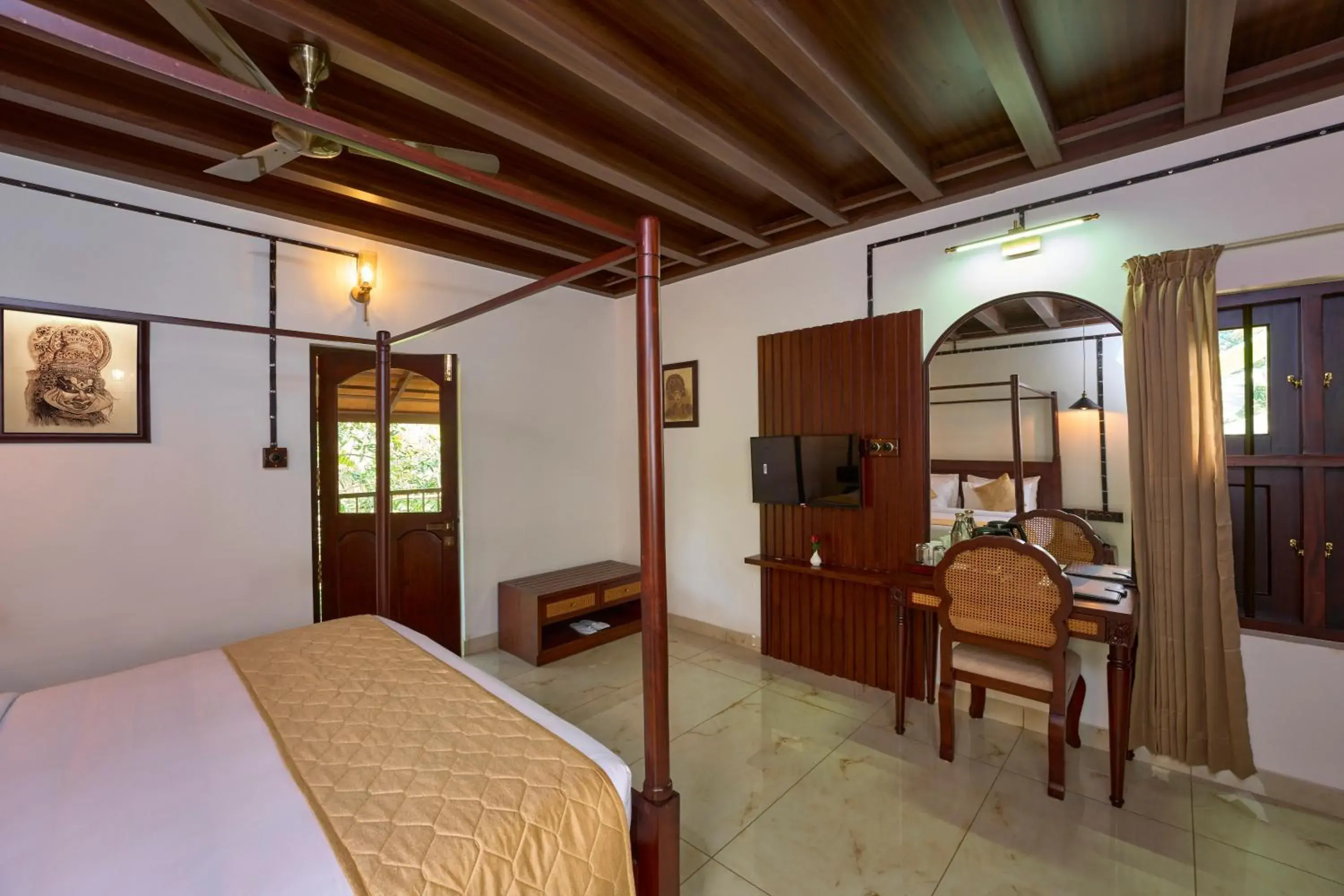 Deluxe Room in Malabar Kovilakam Deluxe Room in Malabar Kovilakam