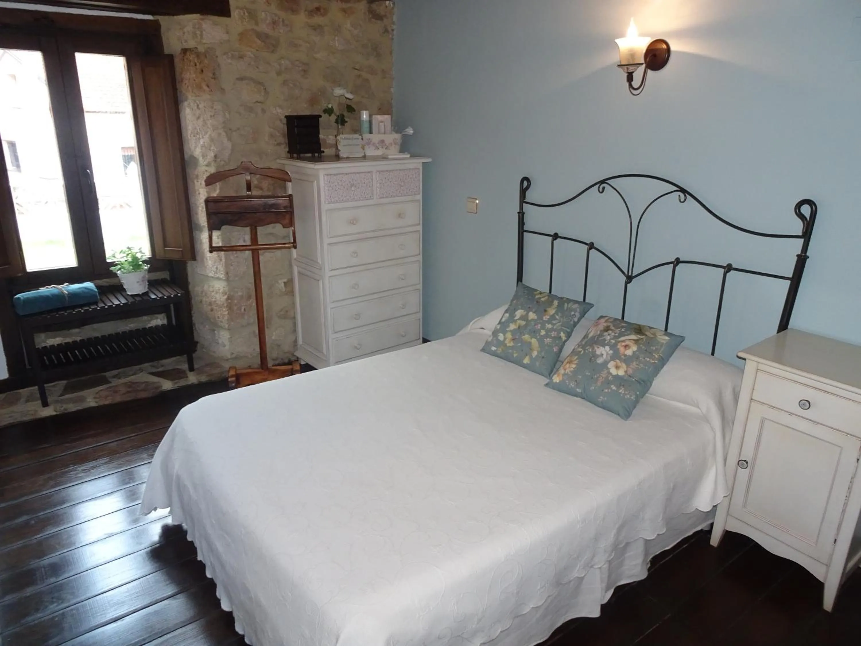 Bed in LA CASONA DE ESCALADA