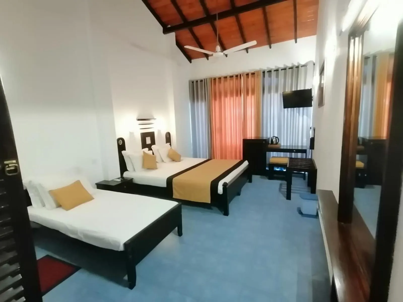 Photo of the whole room, Bed in DALAWELLA BEACH RESORT