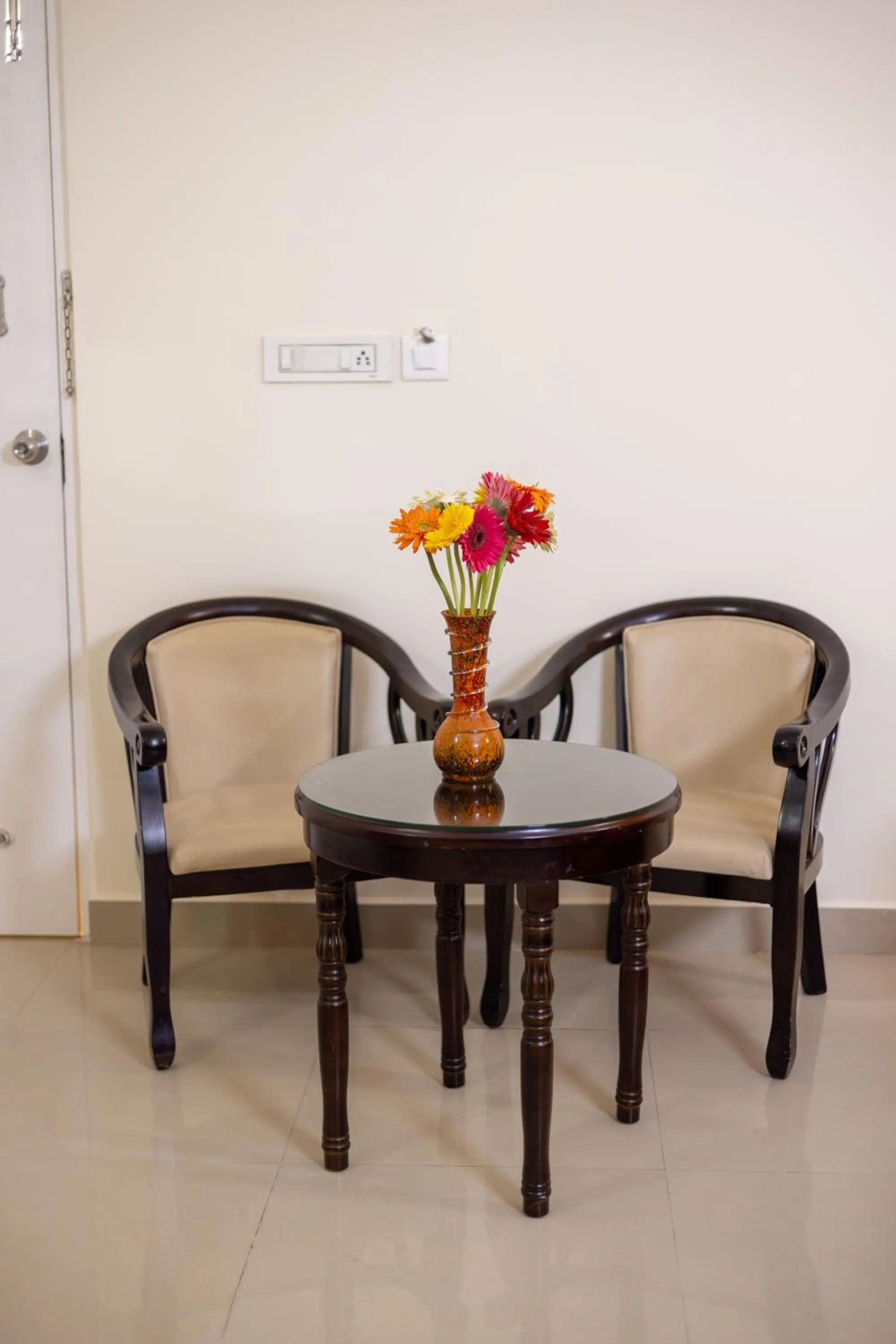 Seating area in Suraksha Stay Brookfield Hotel