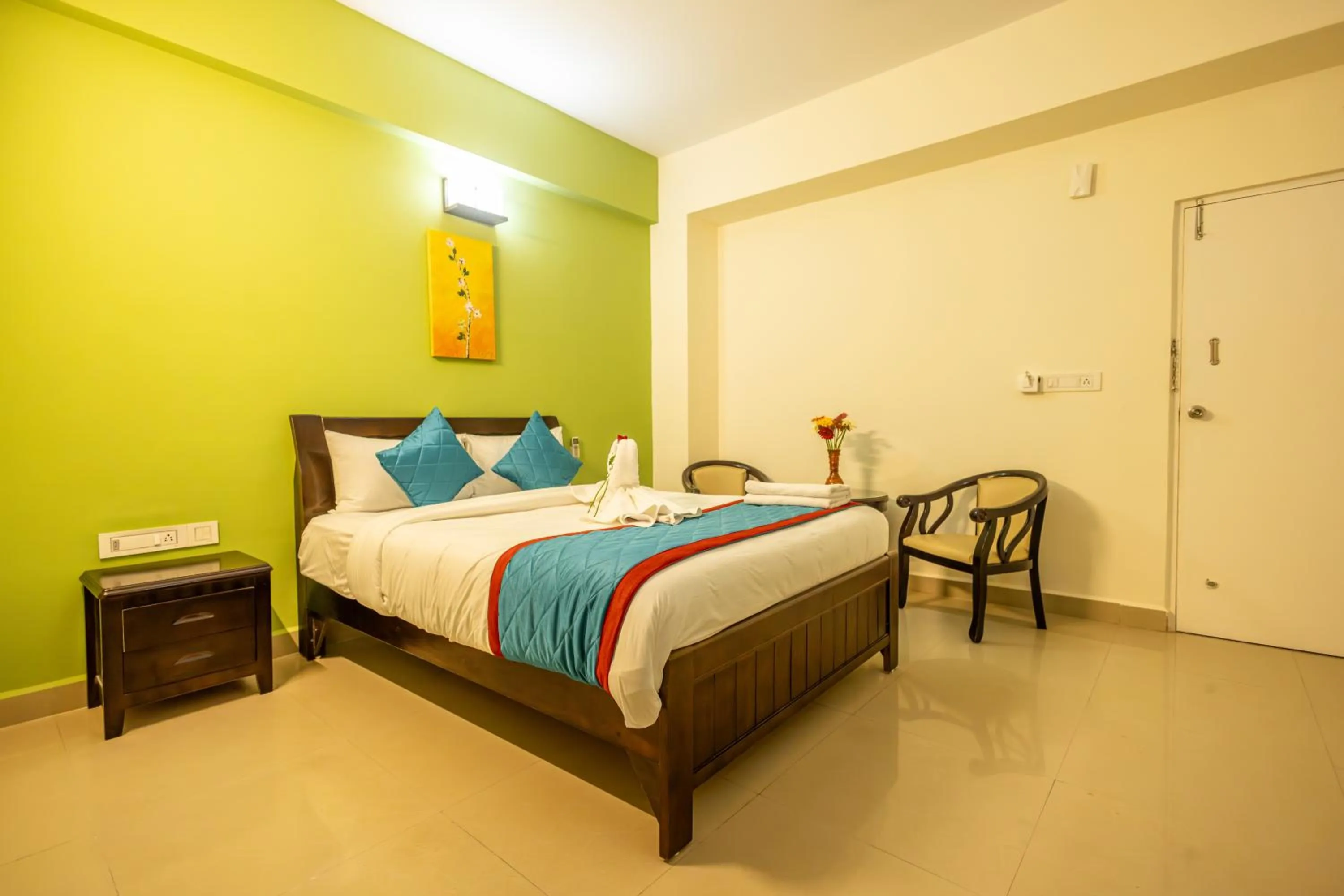 Bed in Suraksha Stay Brookfield Hotel