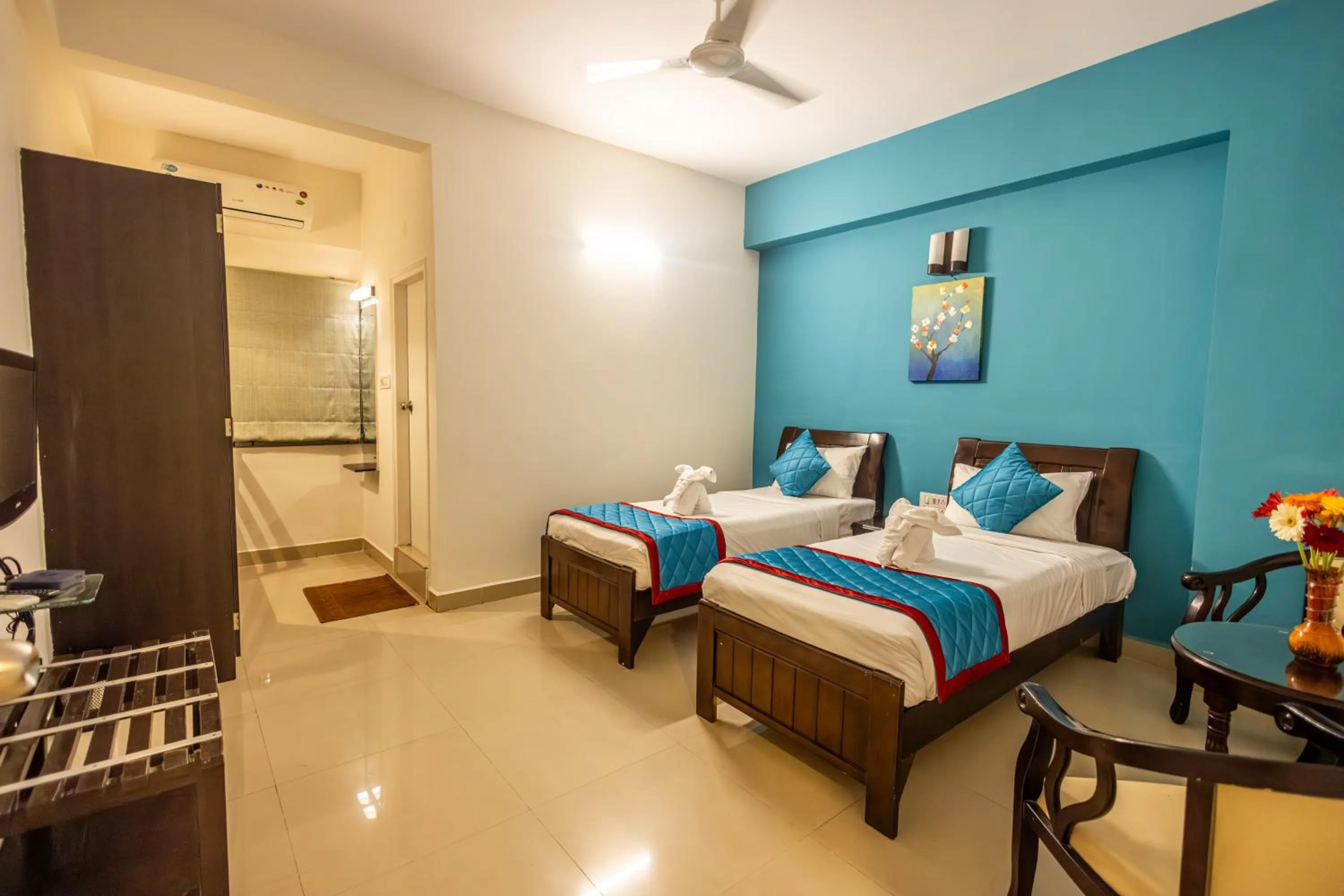 Bed in Suraksha Stay Brookfield Hotel