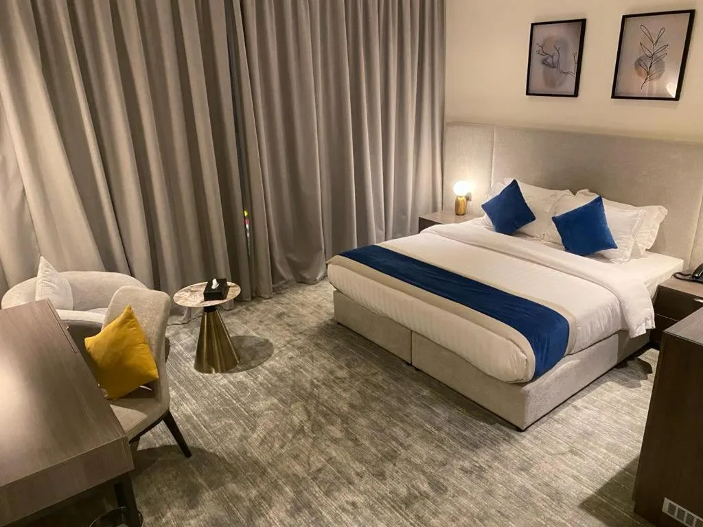 Living room, Bed in Savoye Hotel