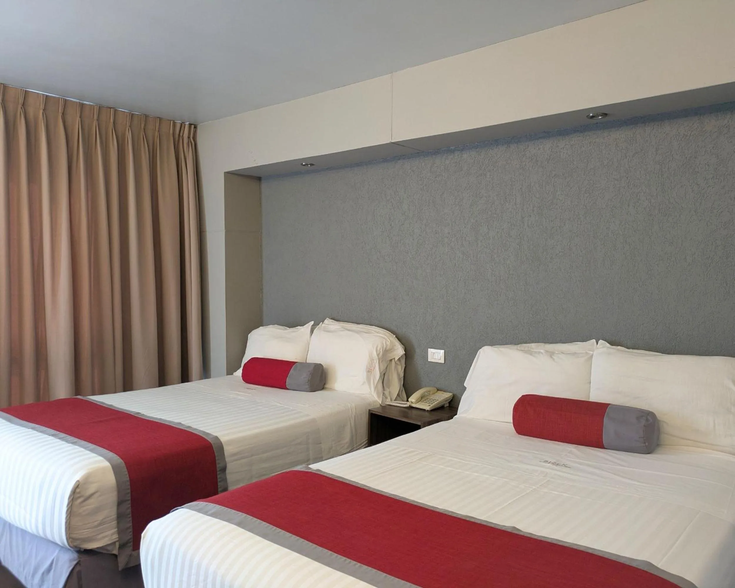 Bed in Hotel Block Suites