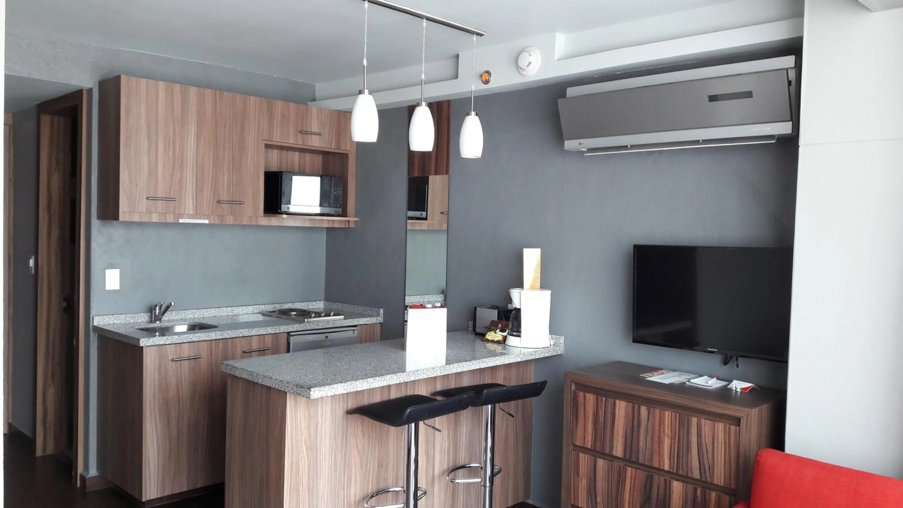 Kitchen or kitchenette in Hotel Block Suites
