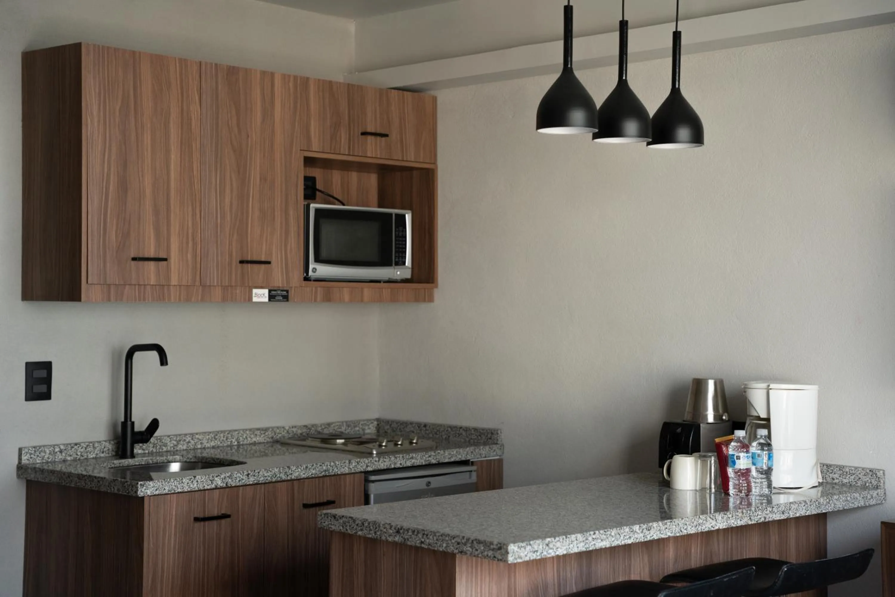 kitchen in Hotel Block Suites