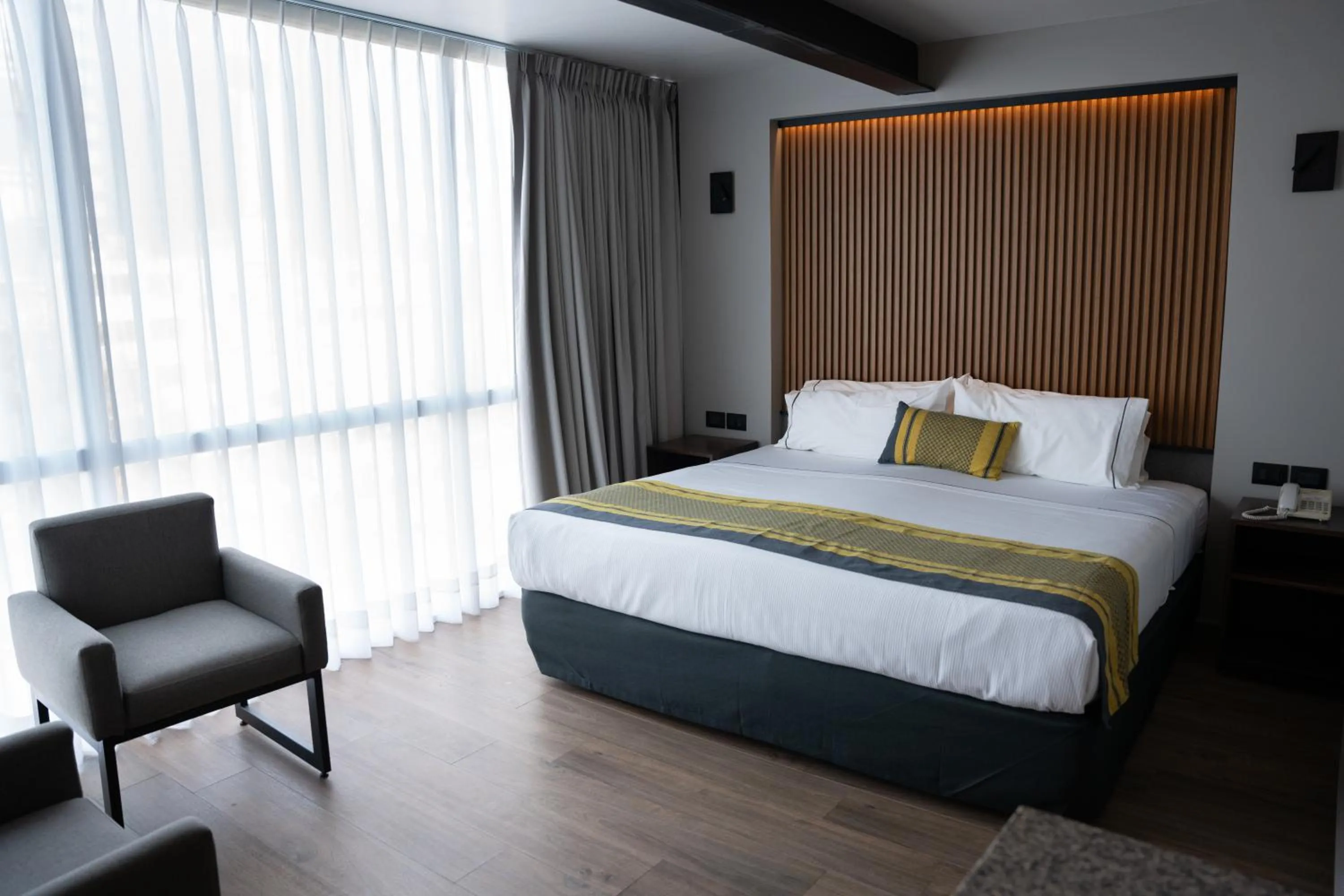 Bed in Hotel Block Suites