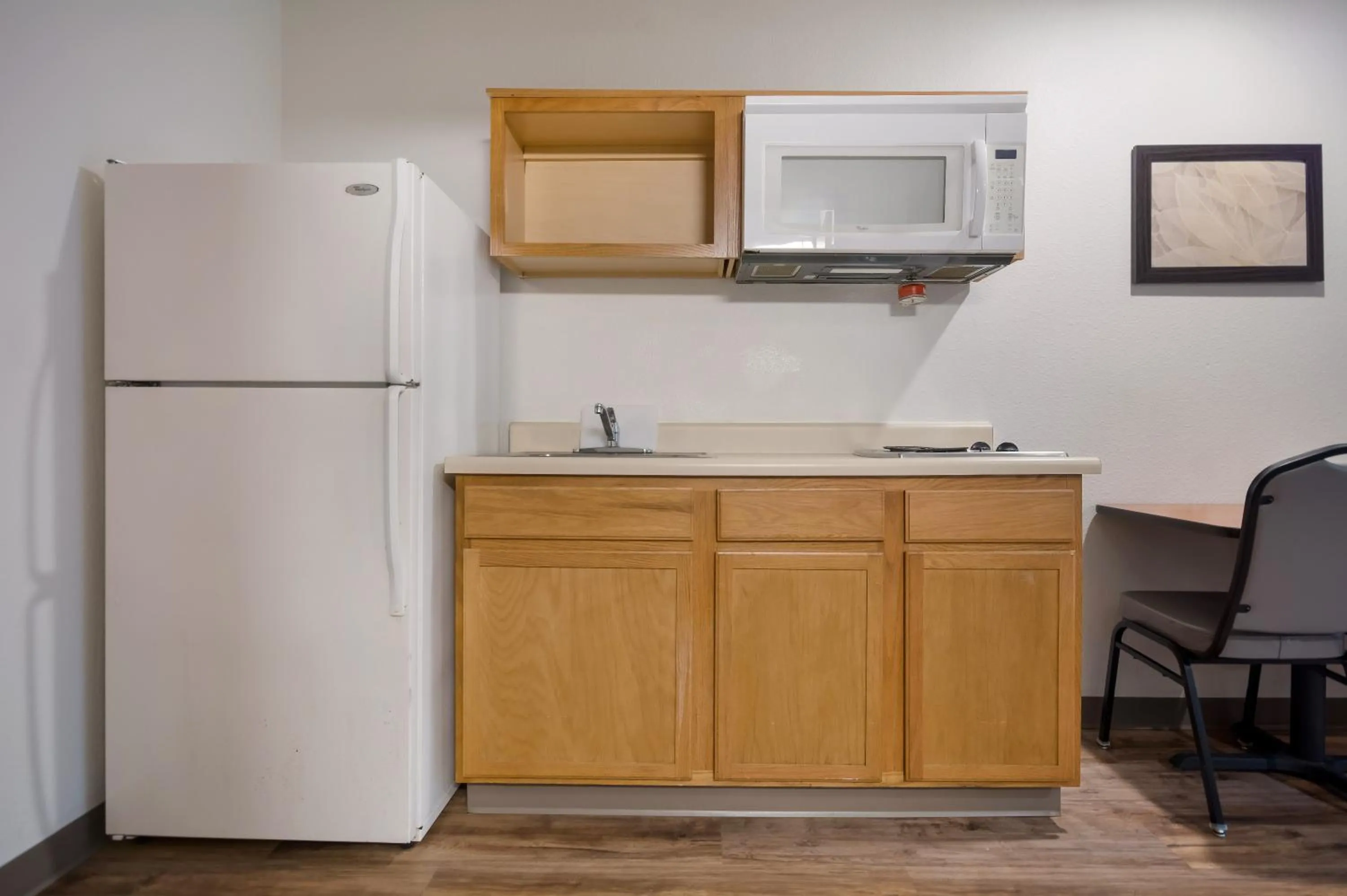 Kitchen or kitchenette in WoodSpring Suites Greenville Central I-85