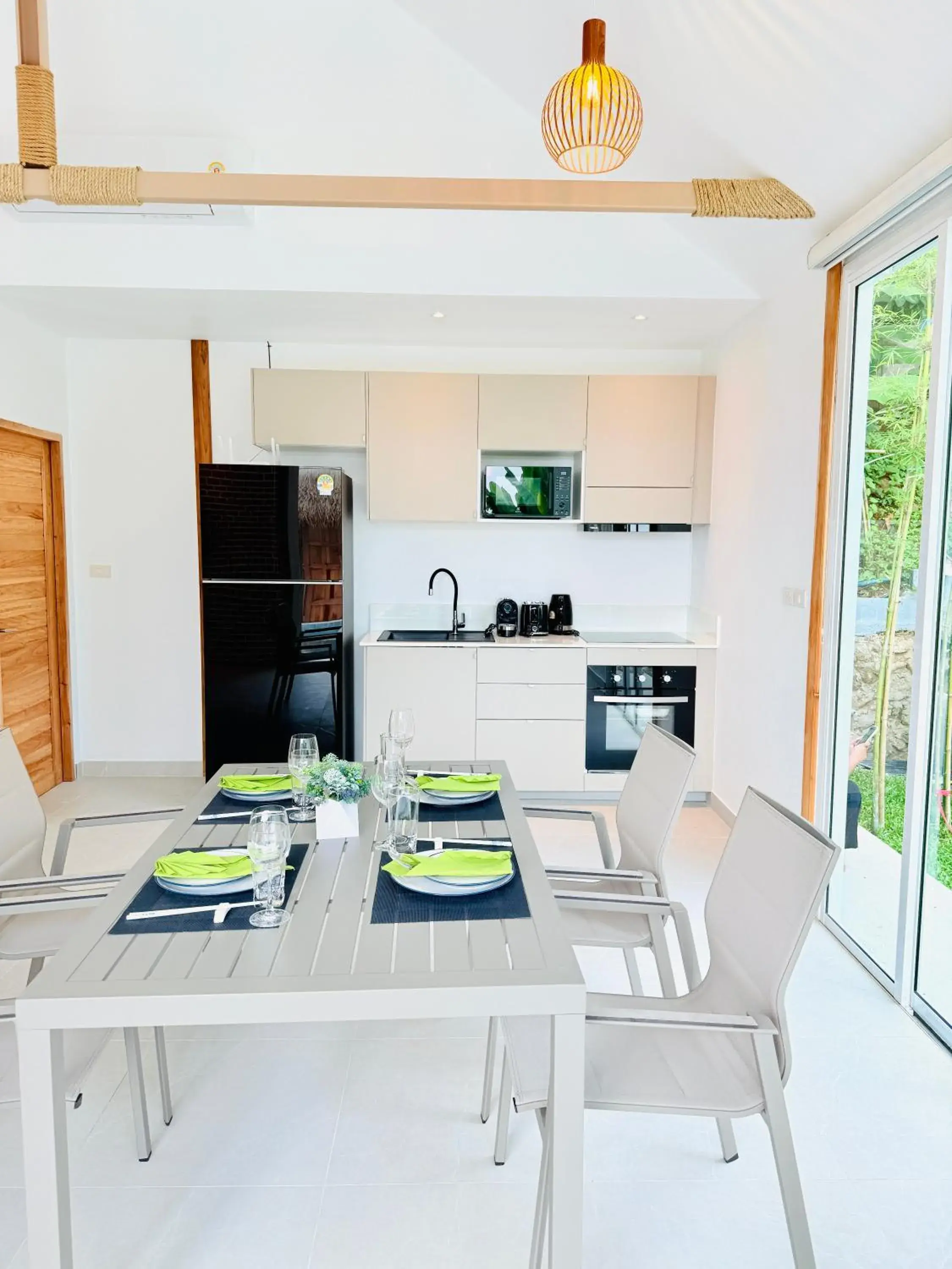 Dining area in Baan Saint-Tropez Seaview Villas Kata Beach Dining area in Baan Saint-Tropez Seaview Villas Kata Beach