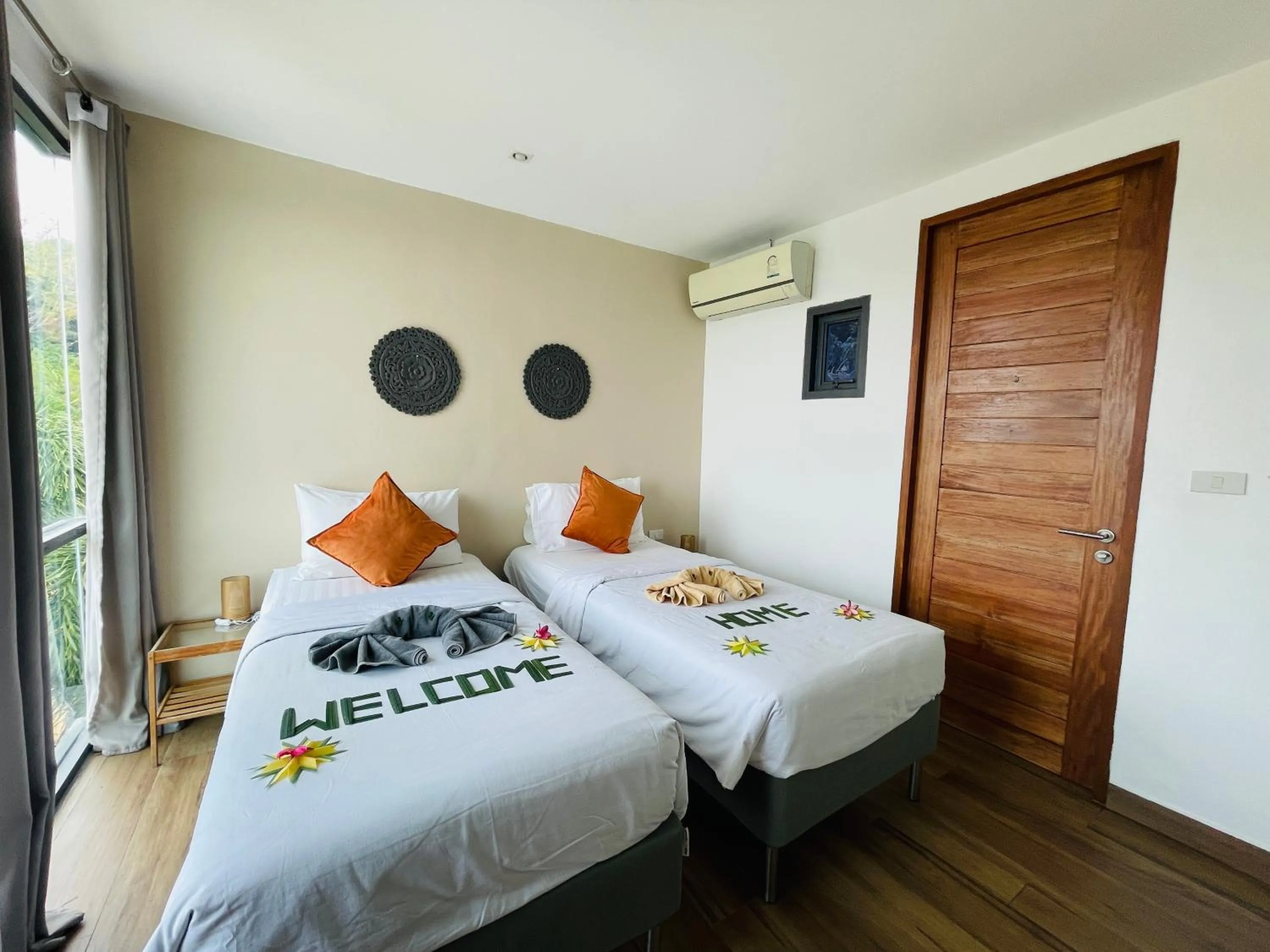 Bed in Baan Saint-Tropez Seaview Villas Kata Beach