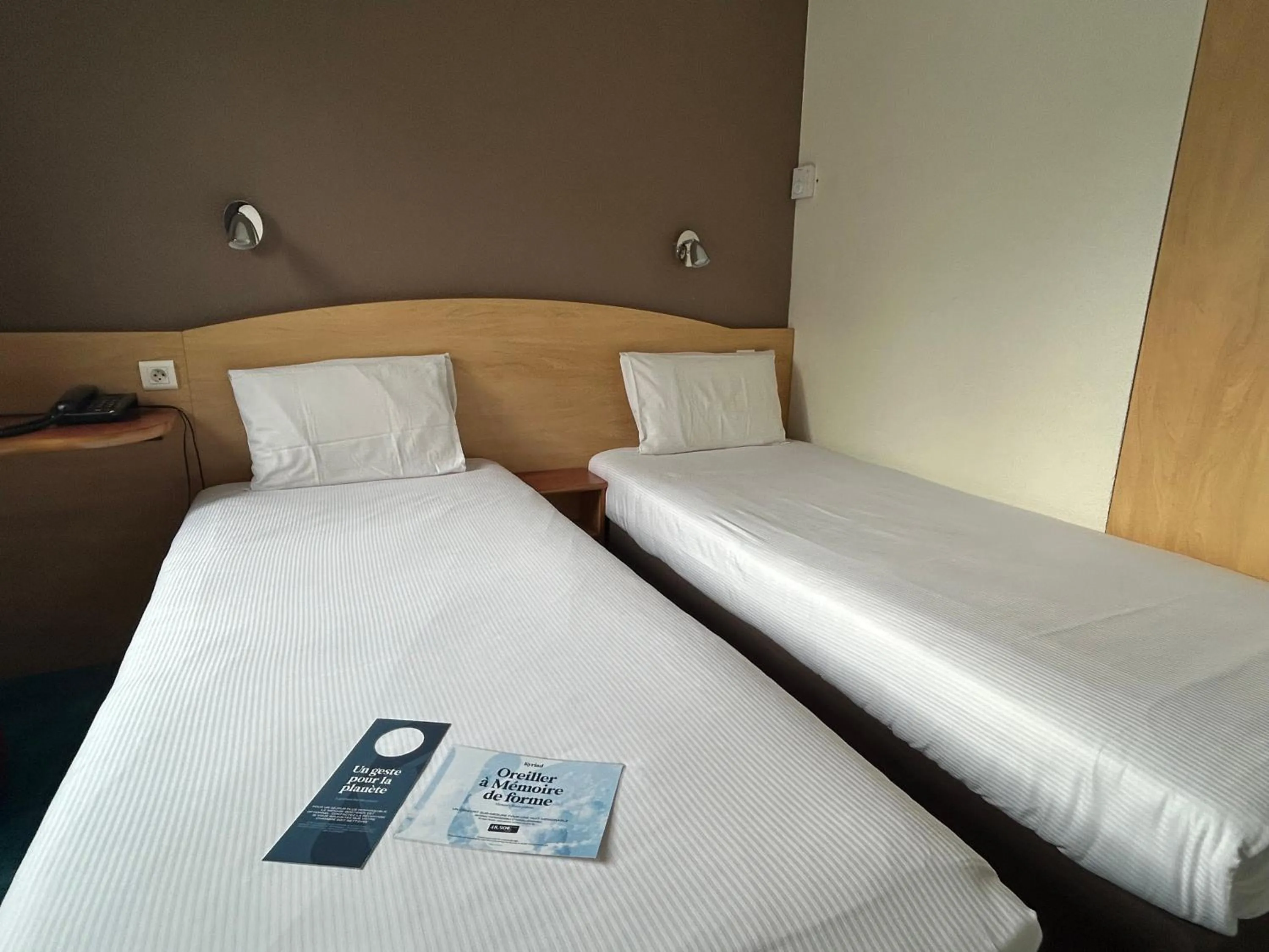Photo of the whole room, Bed in Kyriad Montpellier Aéroport - Gare Sud de France
