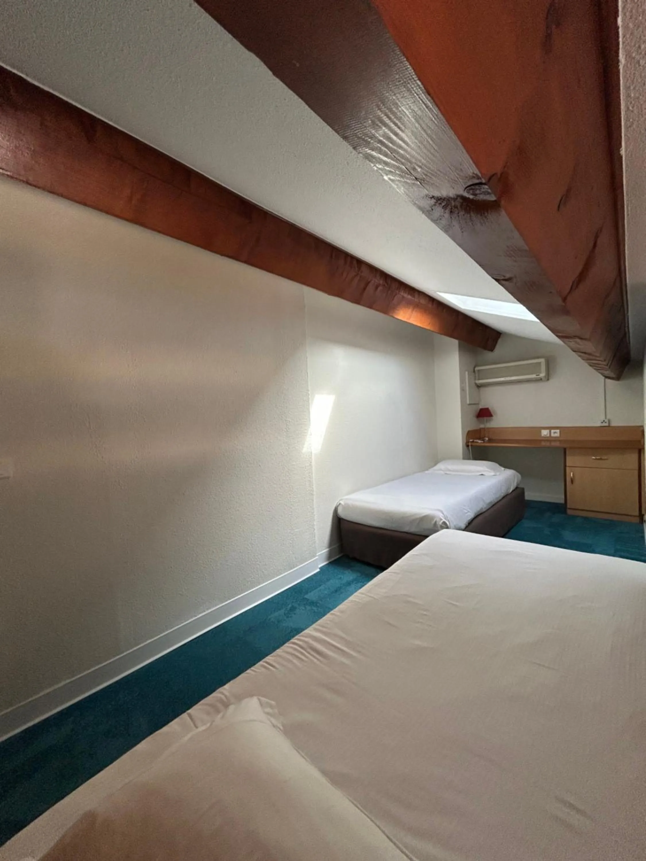 Photo of the whole room, Bed in Kyriad Montpellier Aéroport - Gare Sud de France