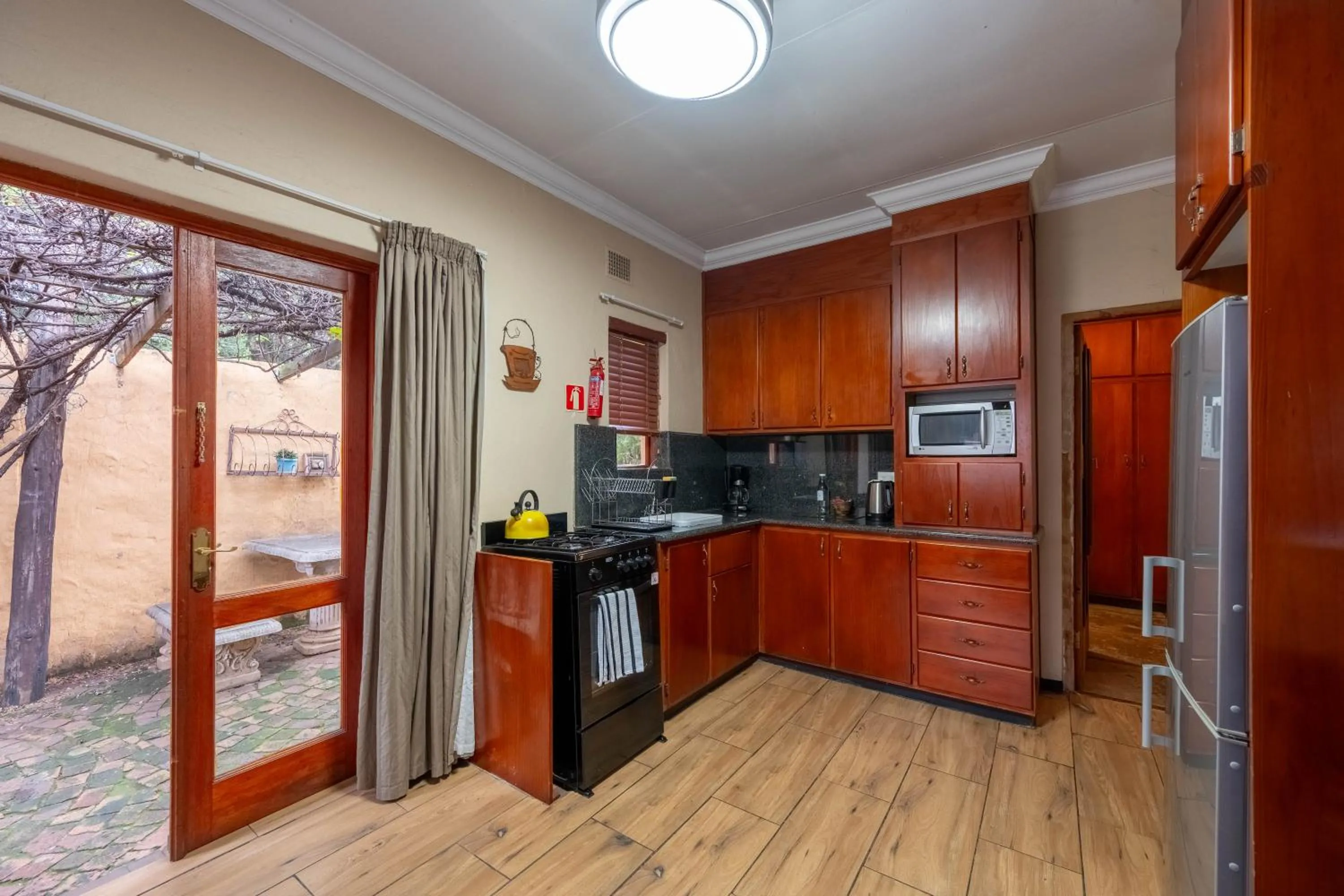 Kitchen or kitchenette in Hampton House Guest House