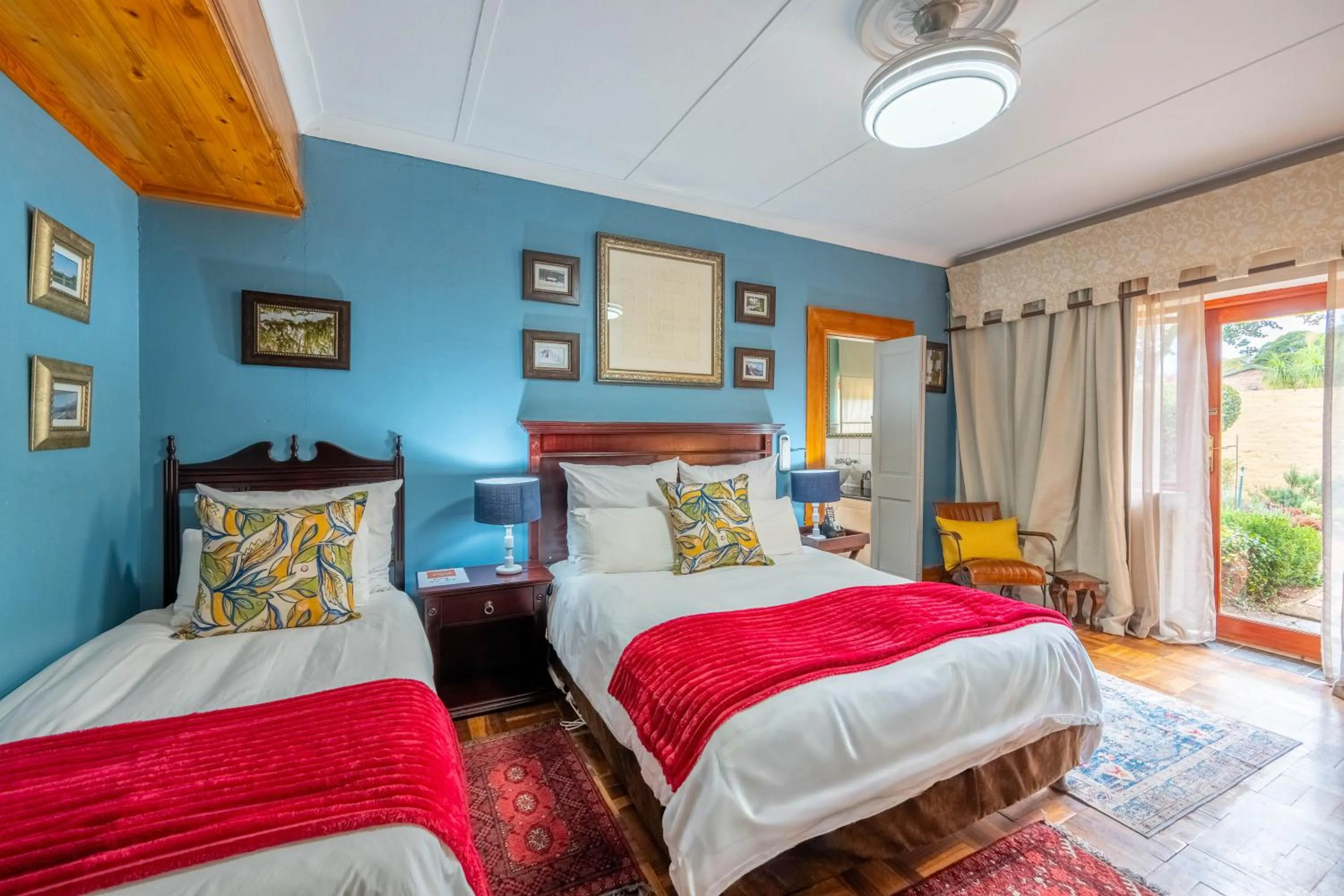 Bed in Hampton House Guest House