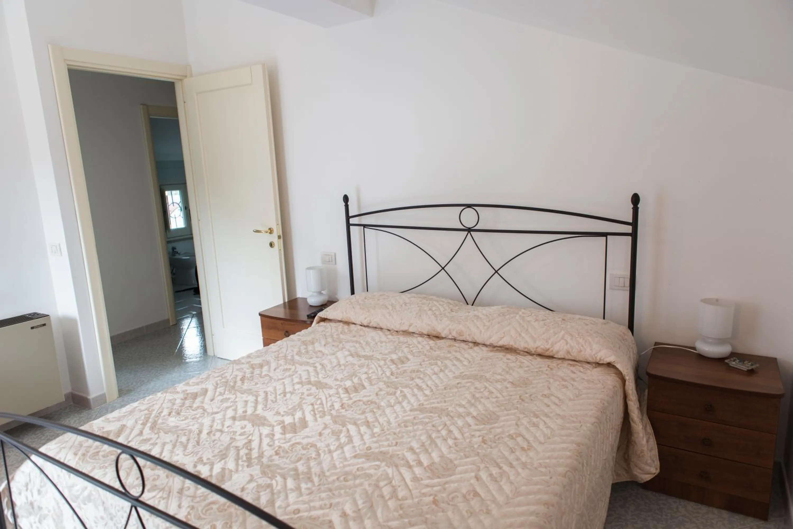 Bed in Rianna Rooms & Breakfast