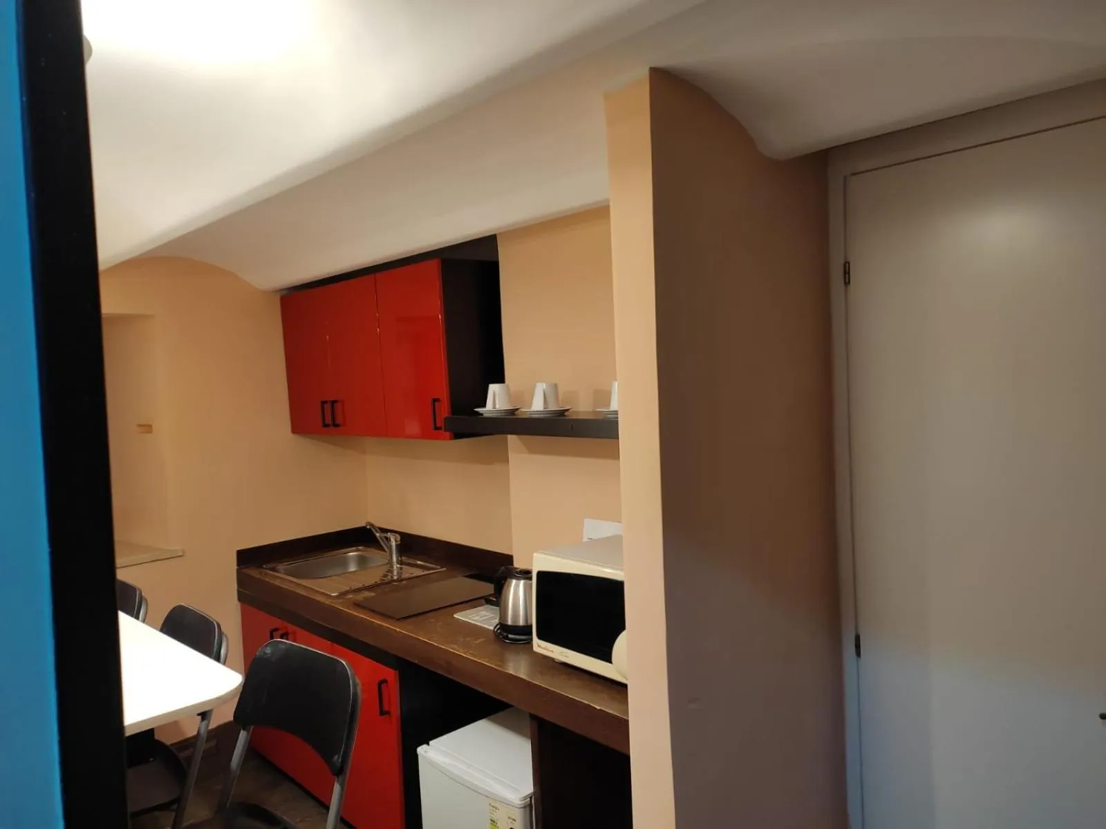 Kitchen or kitchenette in Relais Arco Della Pace