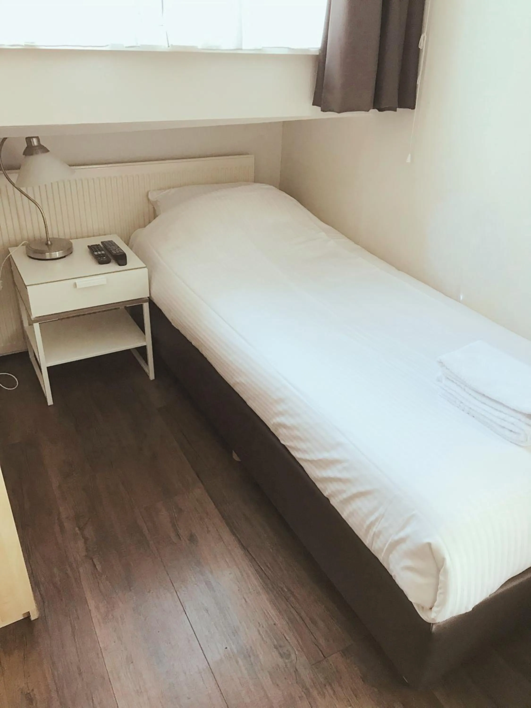 Bed in Hotel Carillon