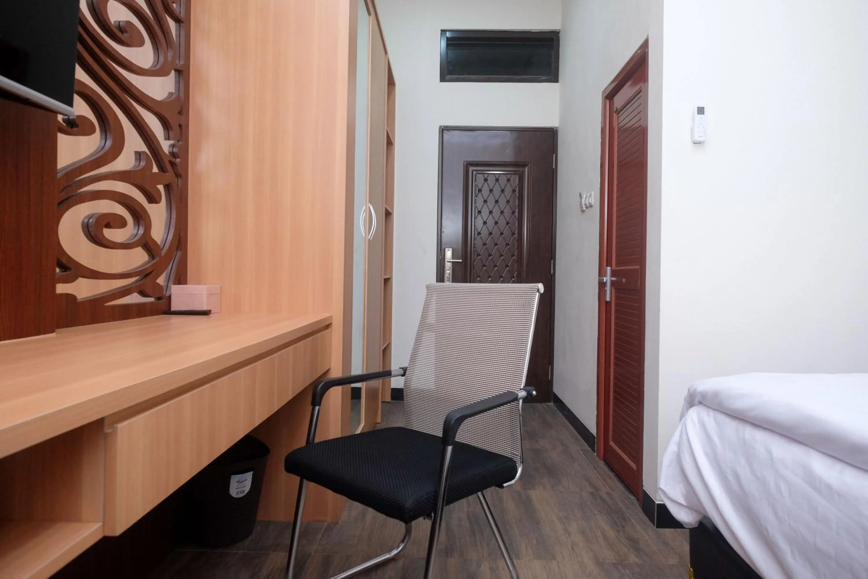 Bed in Urbanview Grand Lotus Hotel by RedDoorz