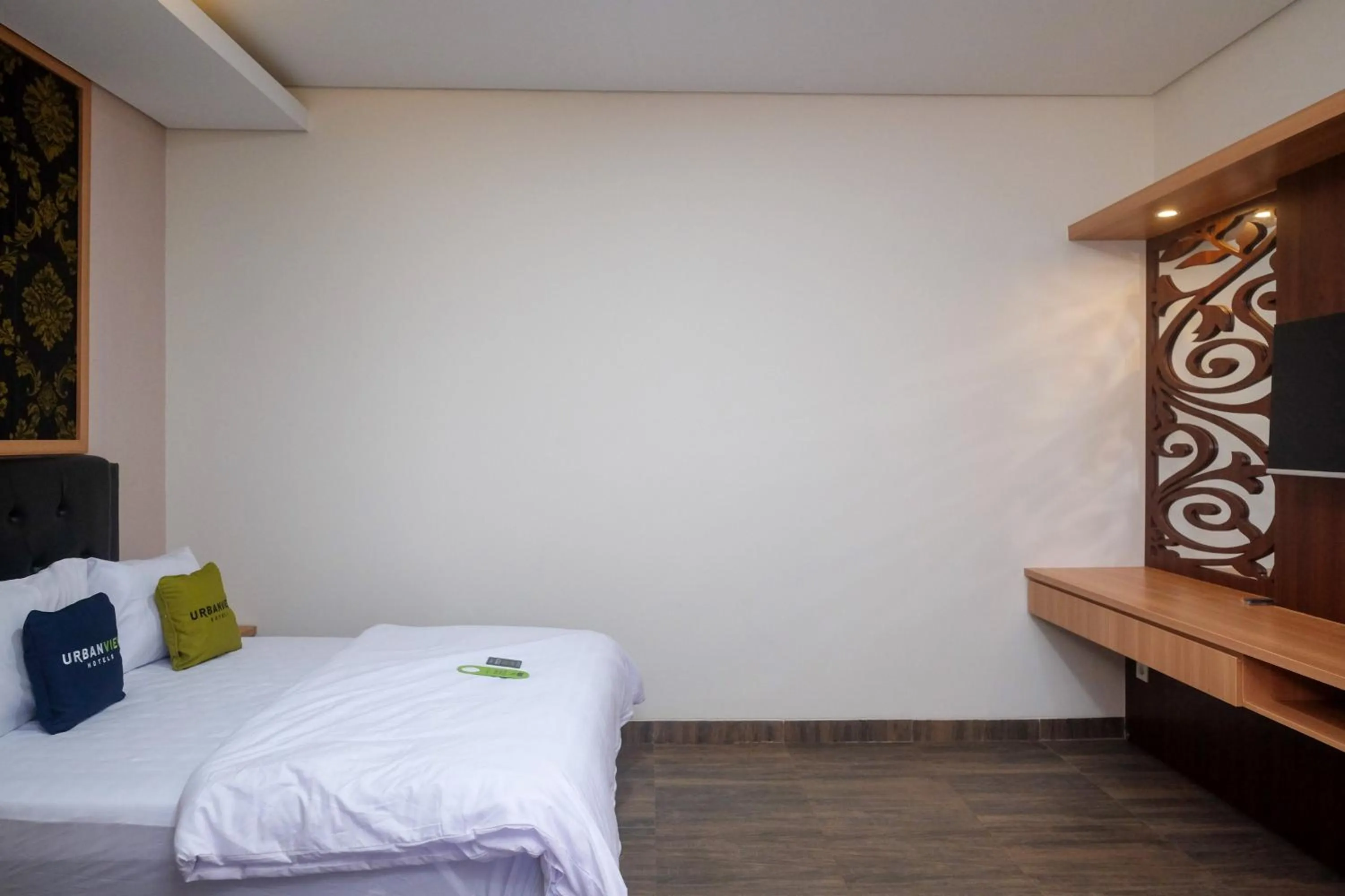 Bed in Urbanview Grand Lotus Hotel by RedDoorz