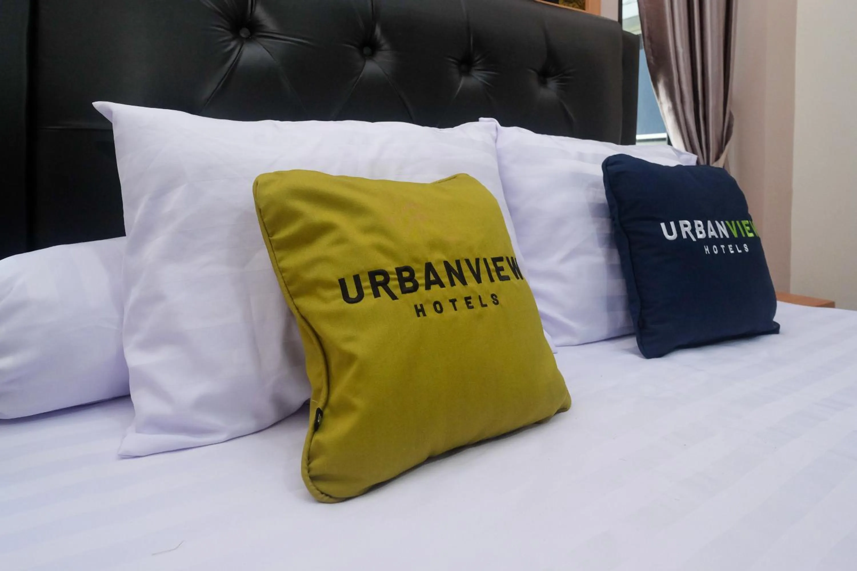 Bed in Urbanview Grand Lotus Hotel by RedDoorz