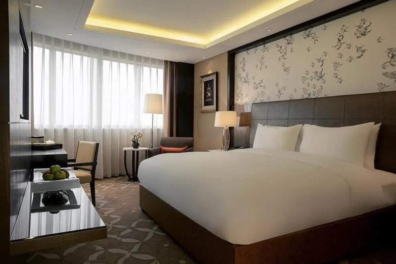 Bed in Grand Mercure Beijing Dongcheng Hotel