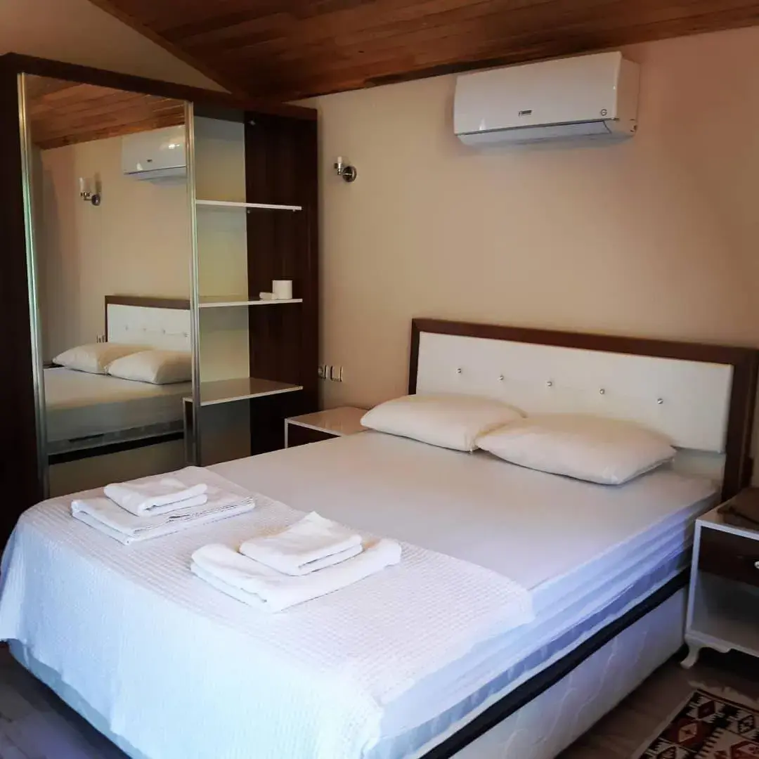 Bungalow - single occupancy - Beach Front in Secret Garden Hotel & Bungalows Bungalow - single occupancy - Beach Front in Secret Garden Hotel & Bungalows