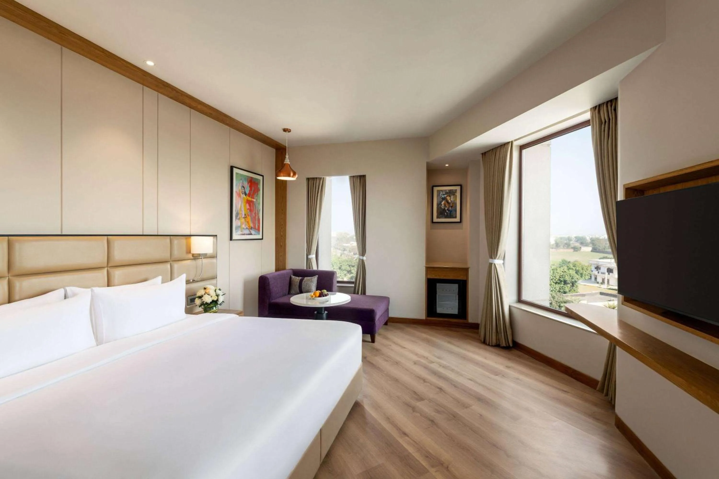 Photo of the whole room, Bed in Ramada Encore by Wyndham Amritsar Airport