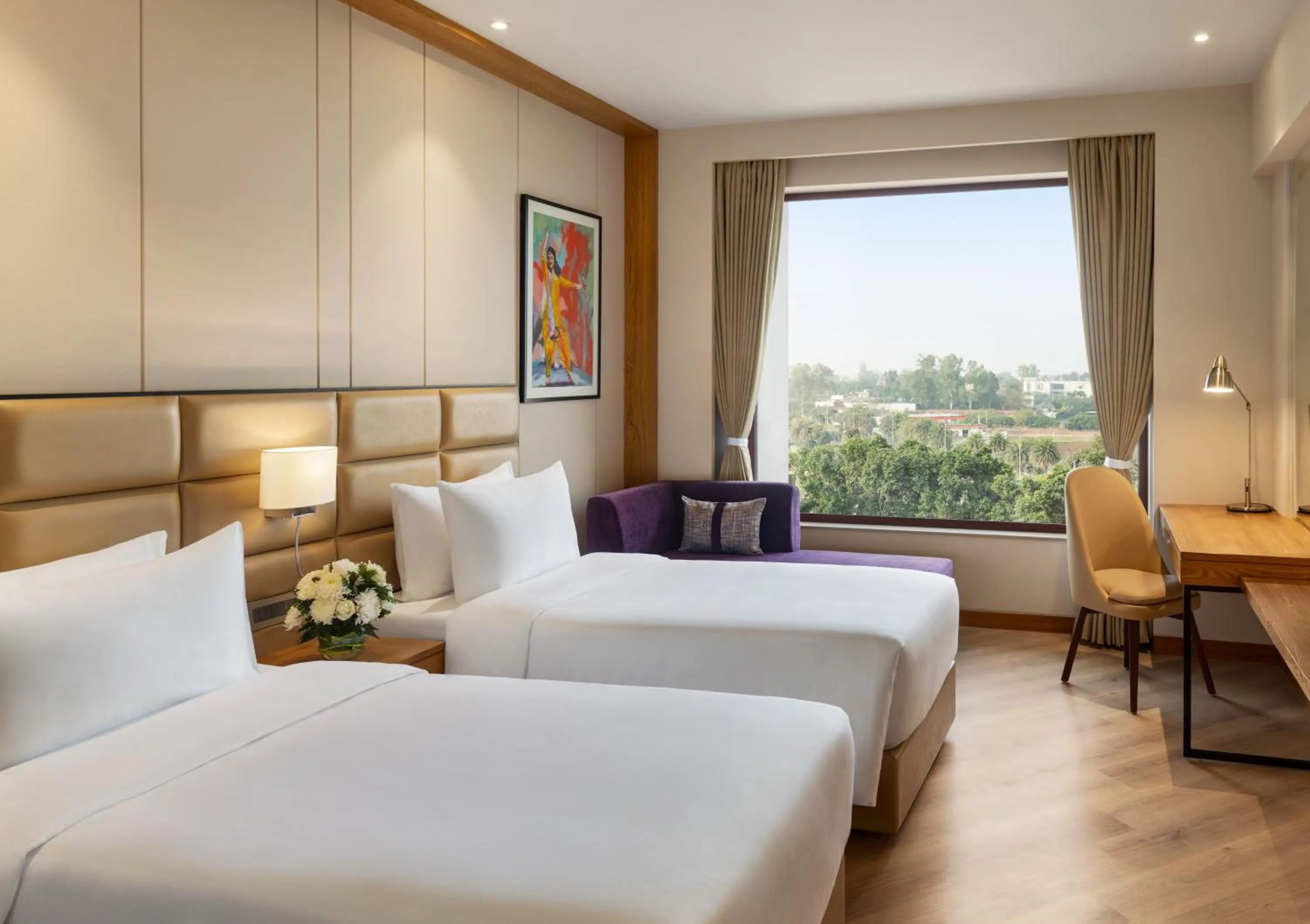 Bed in Ramada Encore by Wyndham Amritsar Airport