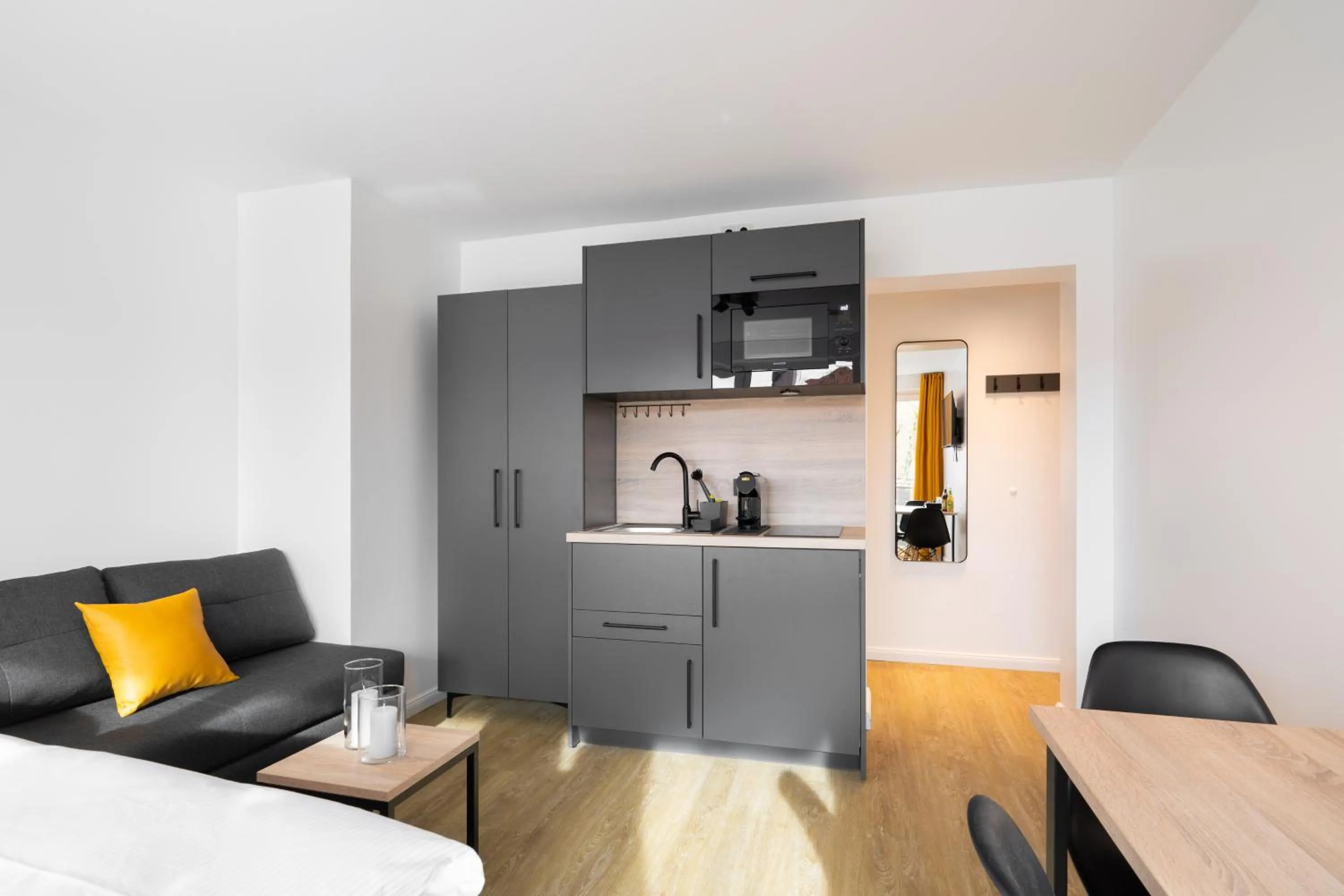 Dining area in Homaris Apartments München Laim