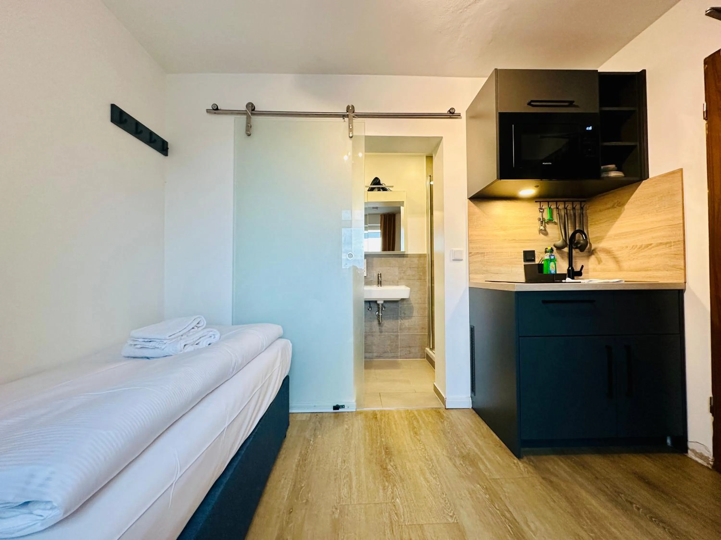 Bed in Homaris Apartments München Laim