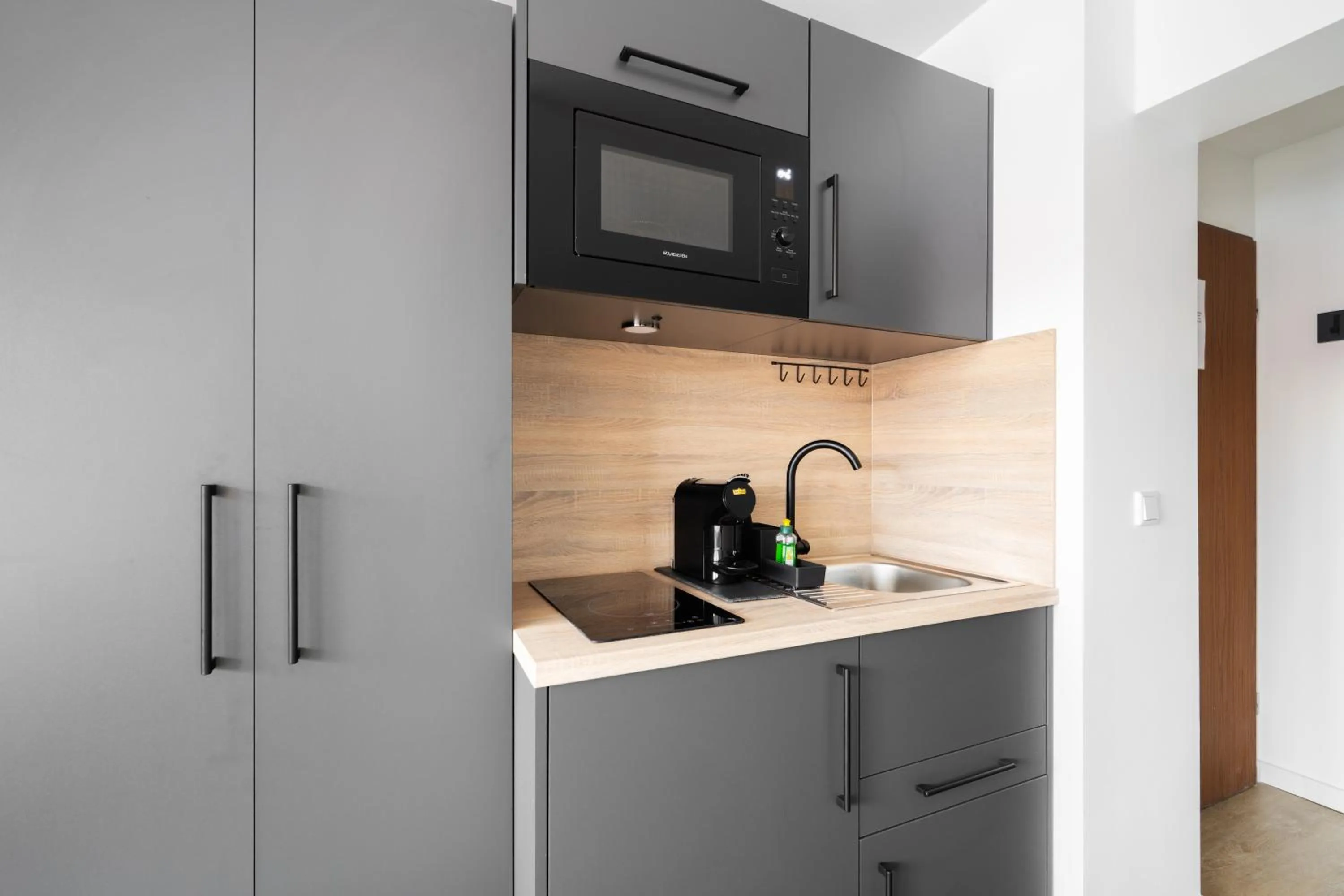 Coffee/tea facilities in Homaris Apartments München Laim