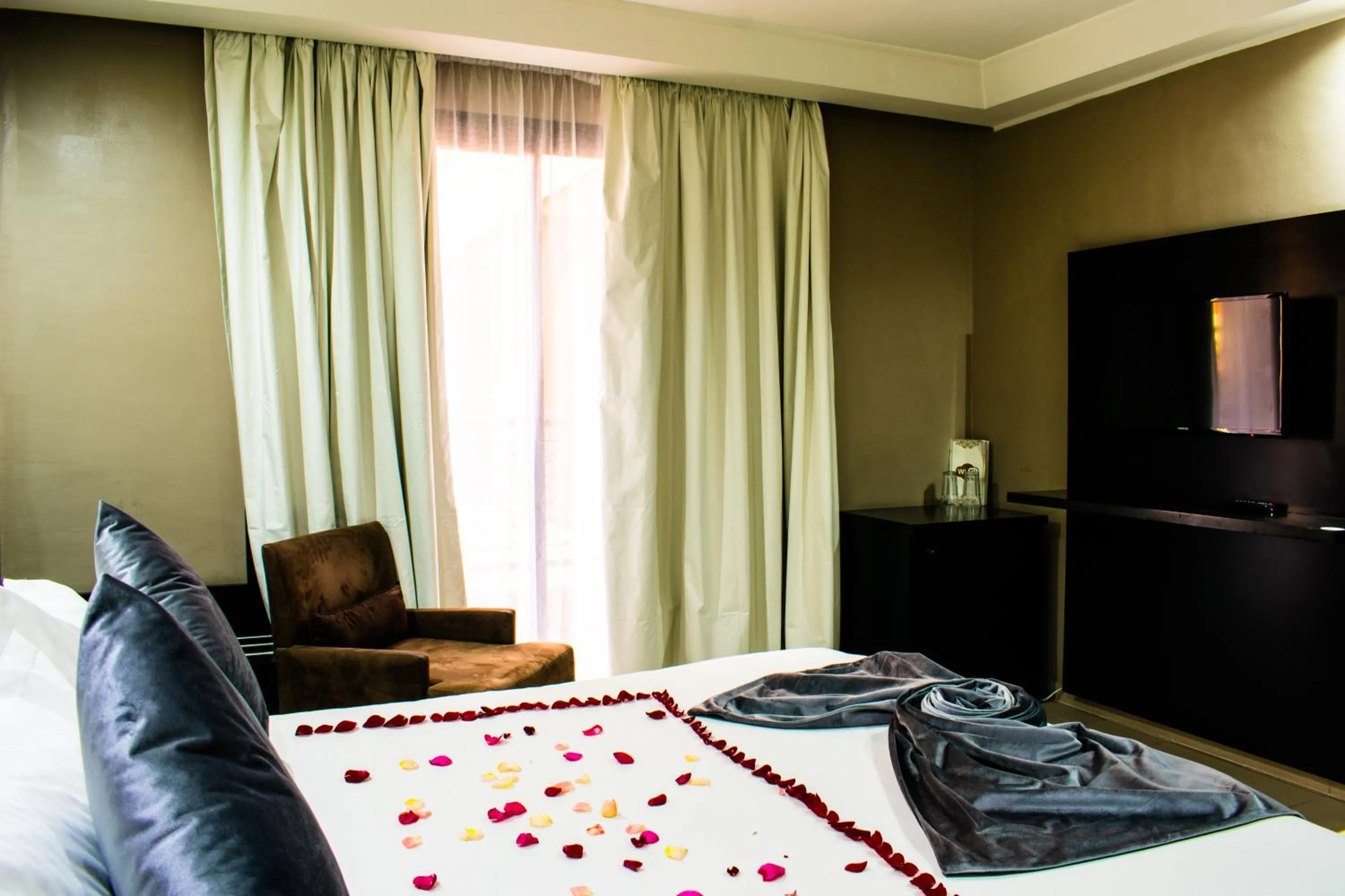 Photo of the whole room, Bed in Tempoo Hotel Marrakech City Centre Adults Only