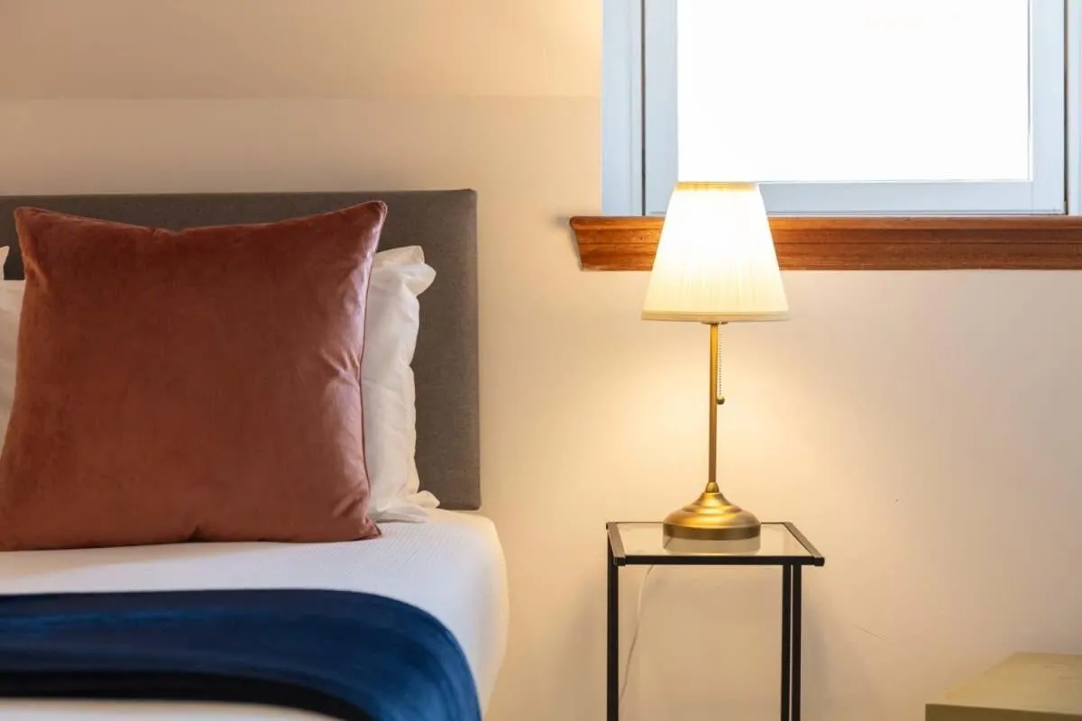 Bed in Cromwell Corner - Donnini Apartments