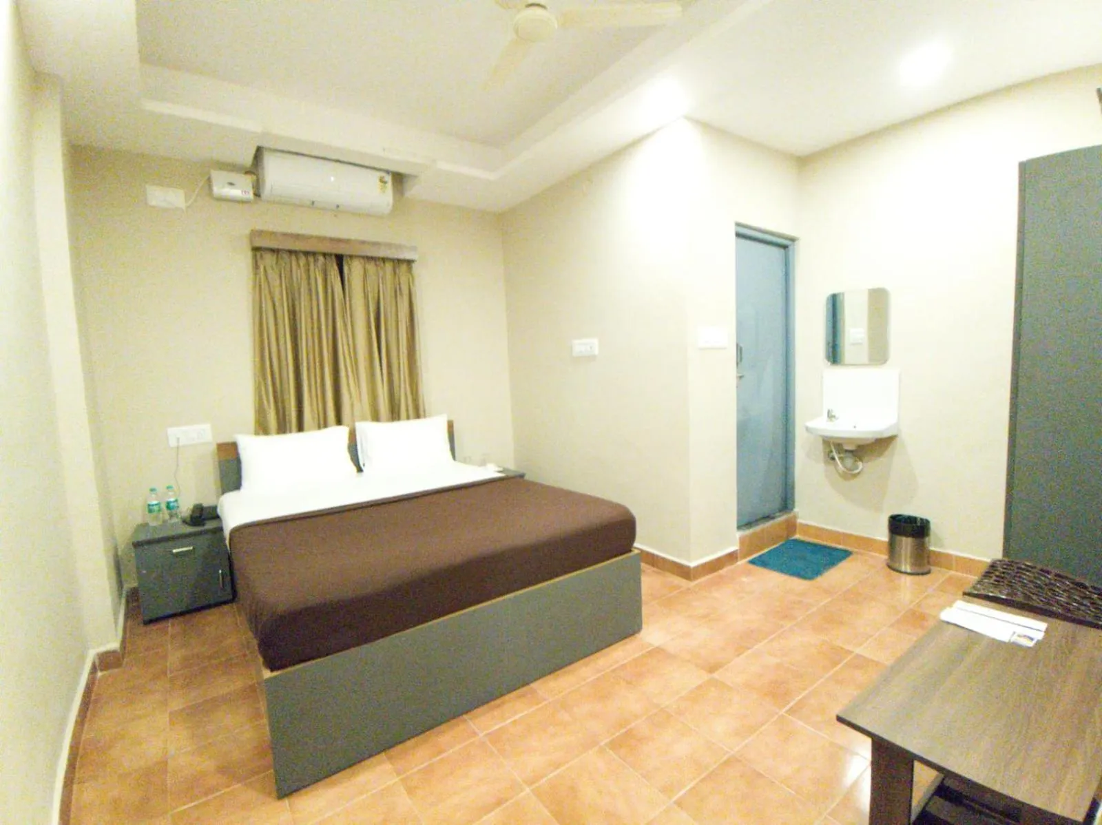 Bed in The Nisarga Residency