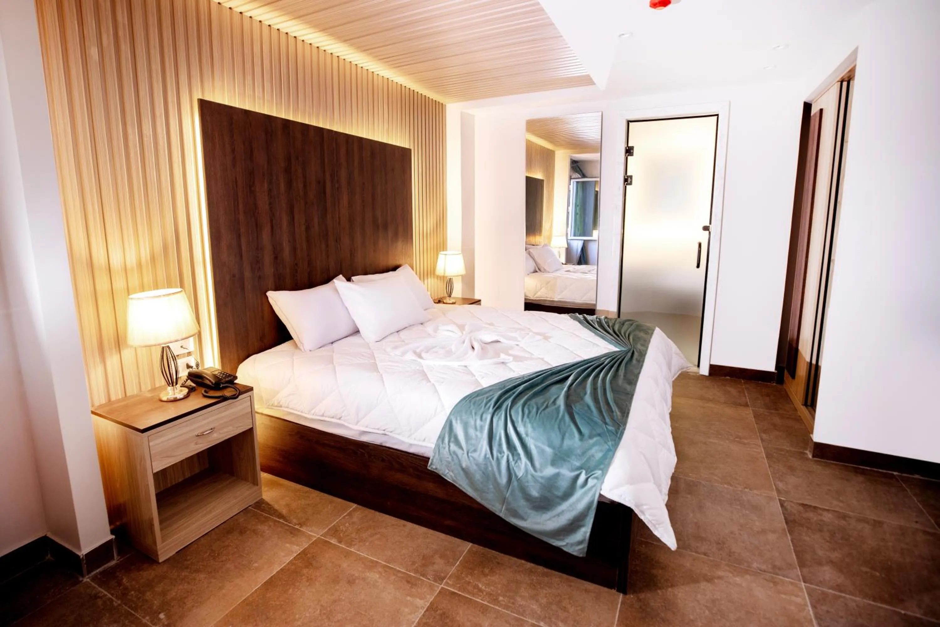 Bed in Blue Pyramids Eyes Hotel