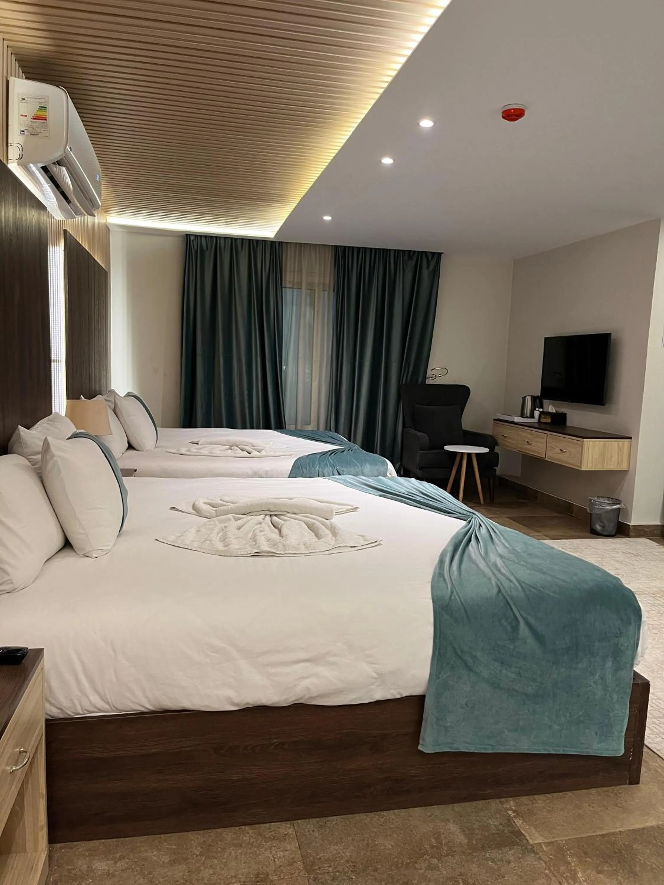 Bed in Blue Pyramids Eyes Hotel