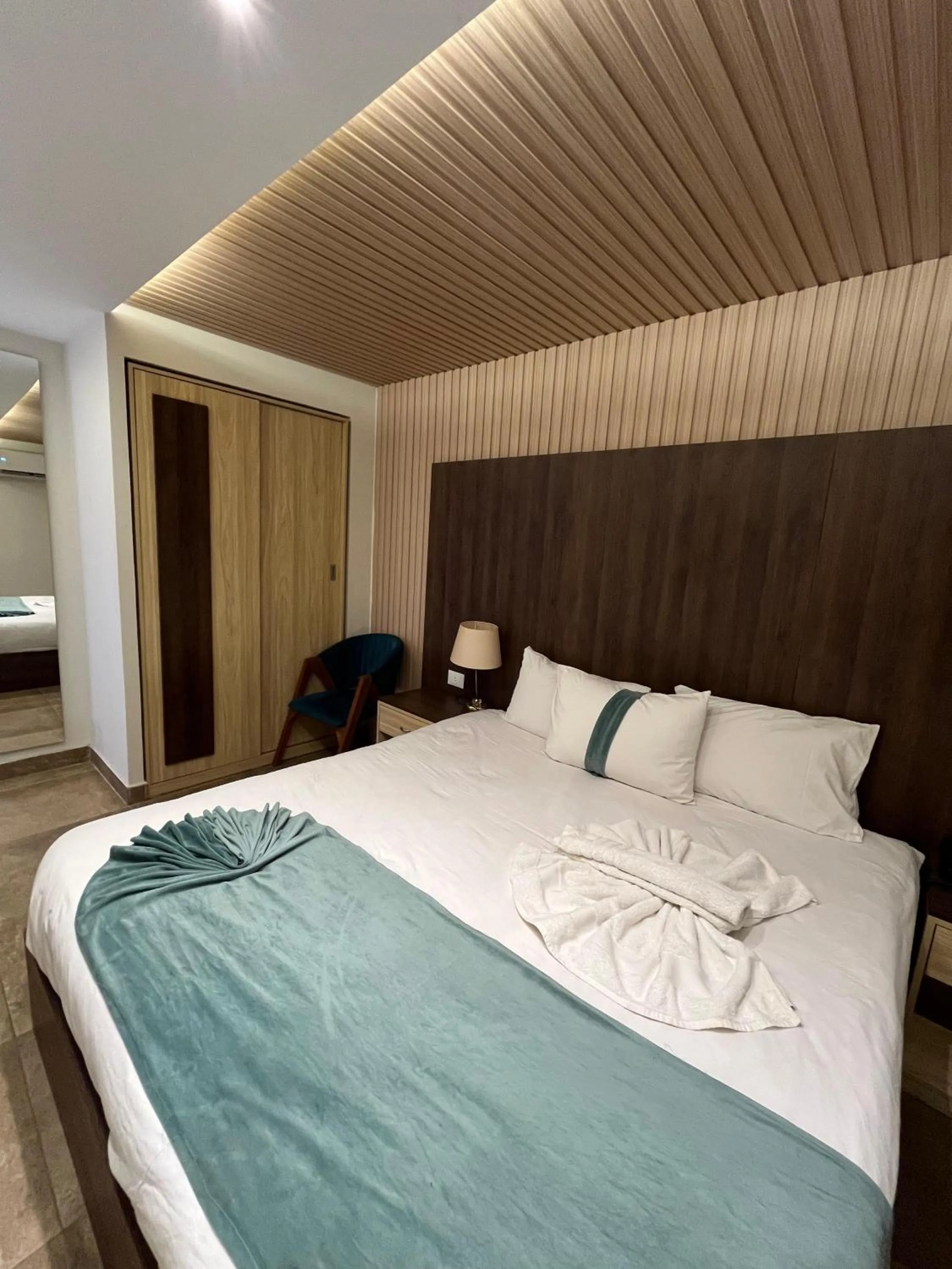 Bed in Blue Pyramids Eyes Hotel