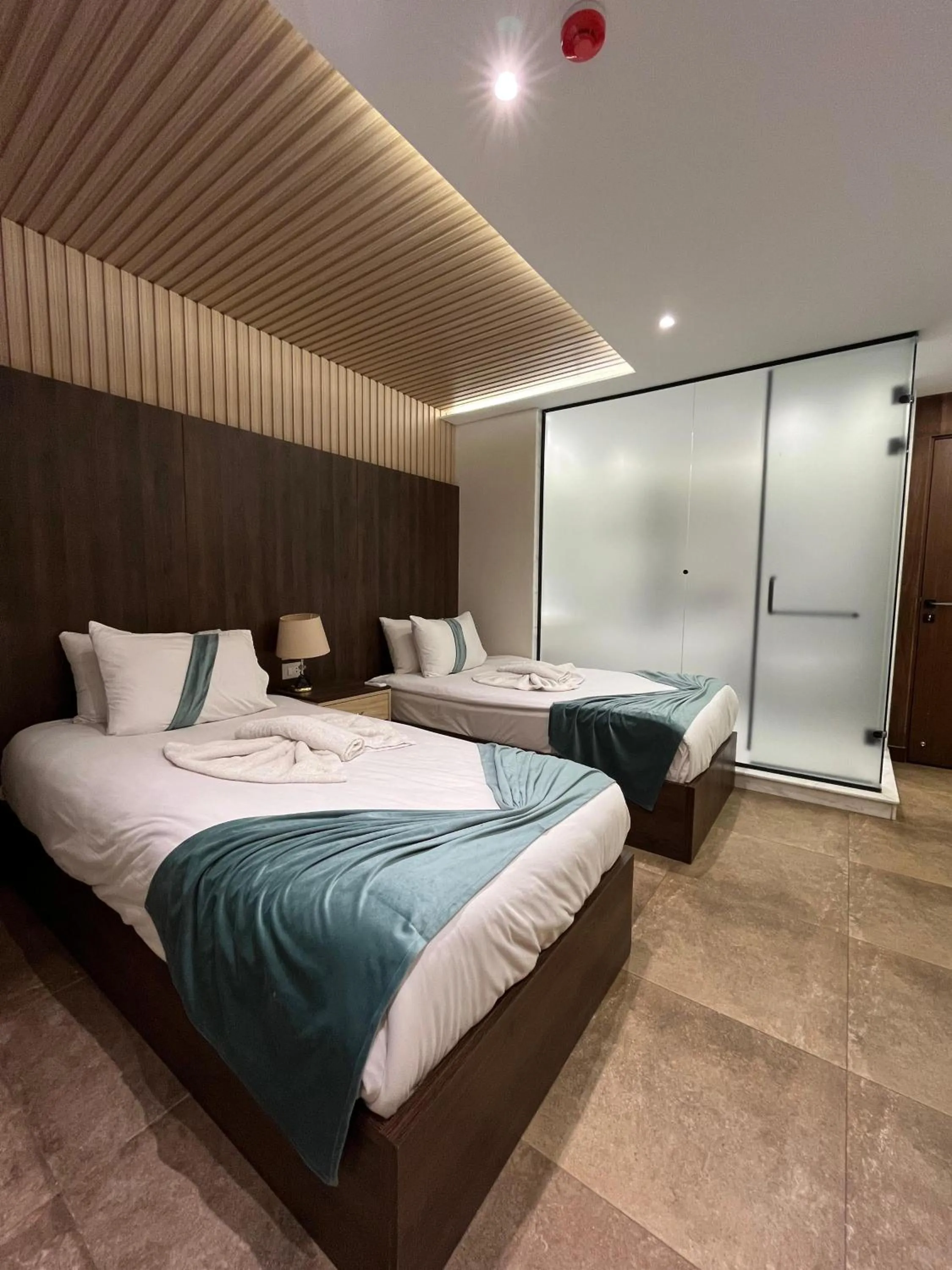 Bed in Blue Pyramids Eyes Hotel