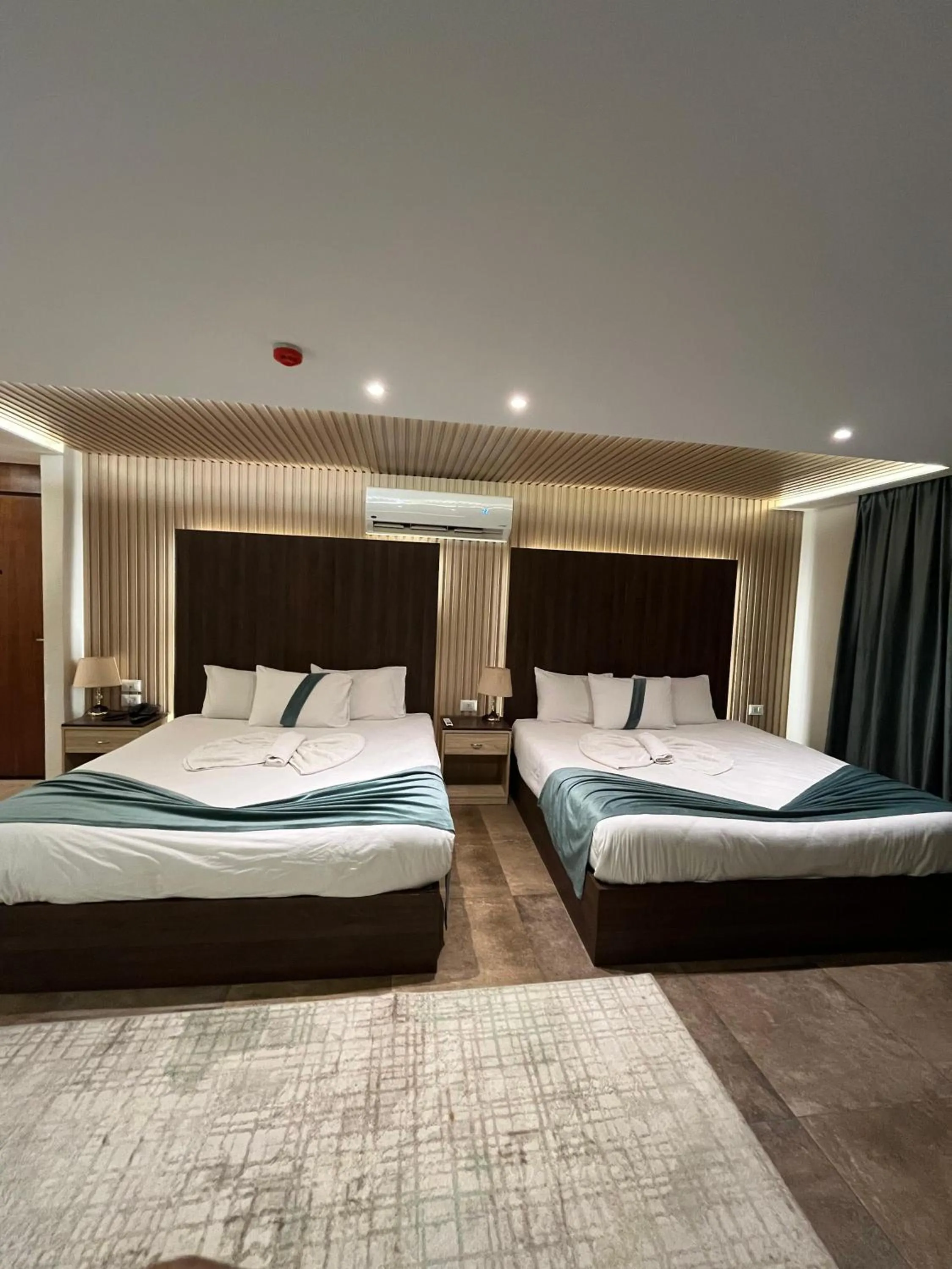 Bed in Blue Pyramids Eyes Hotel