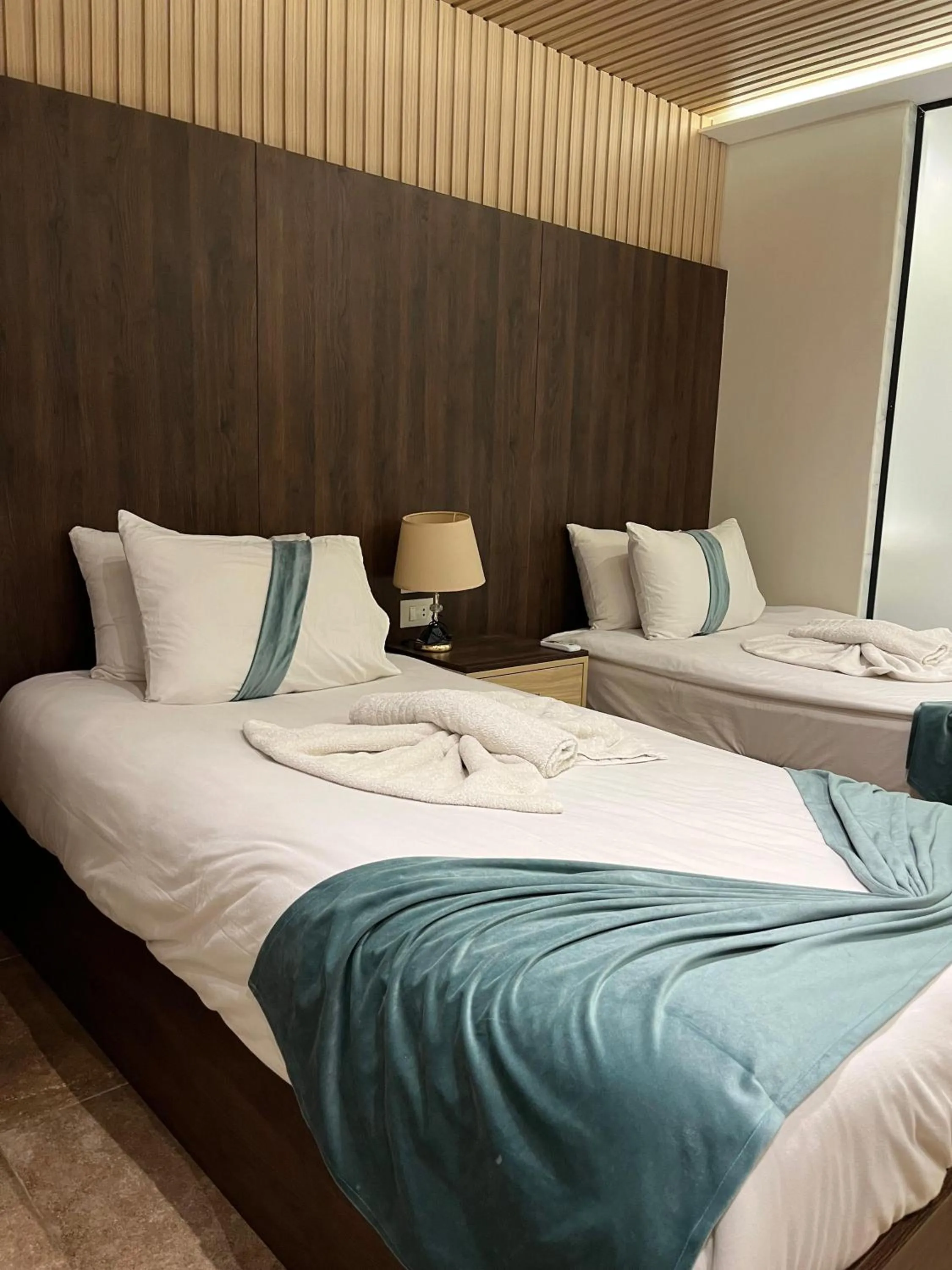 Bed in Blue Pyramids Eyes Hotel