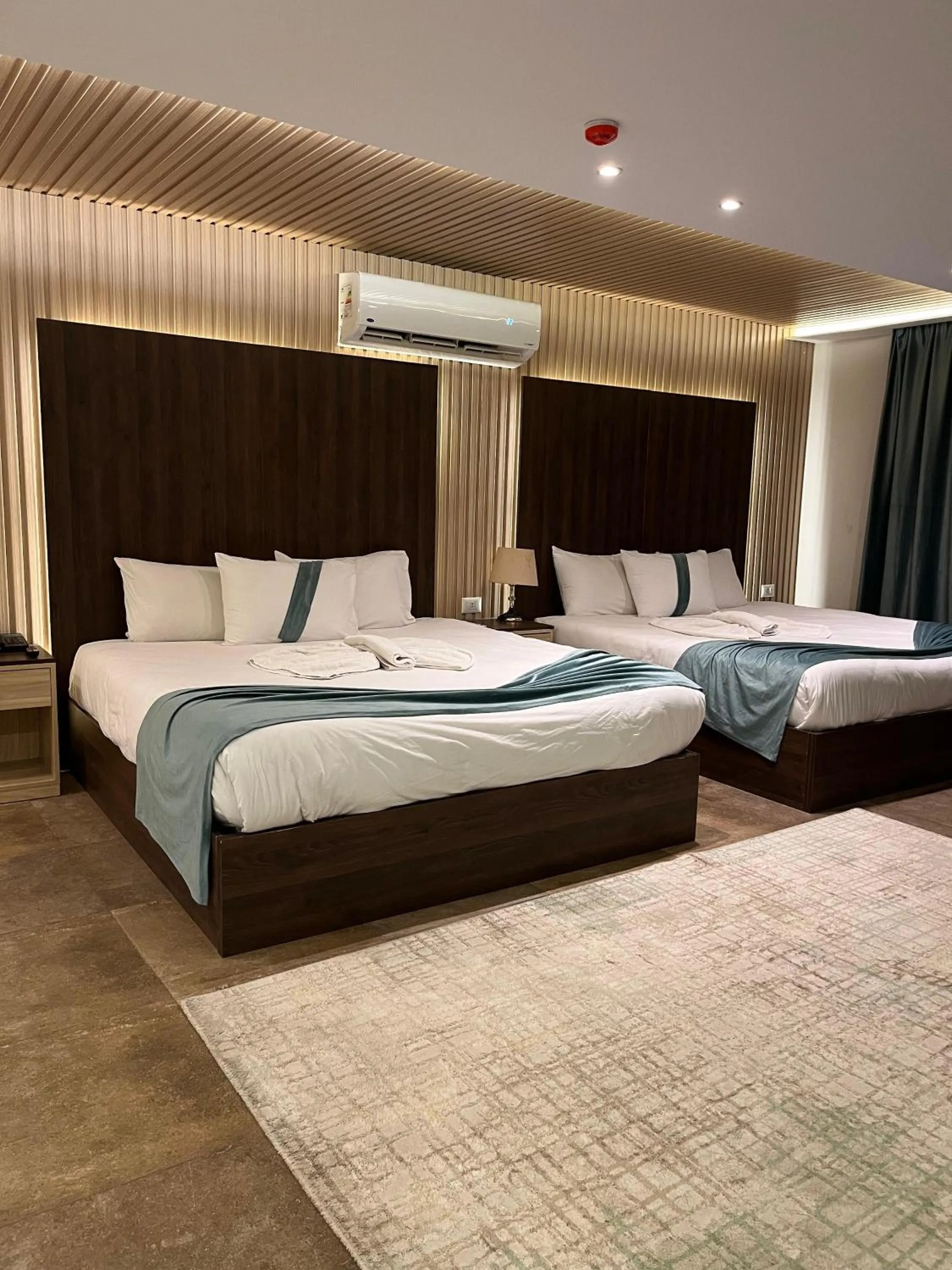 Bed in Blue Pyramids Eyes Hotel