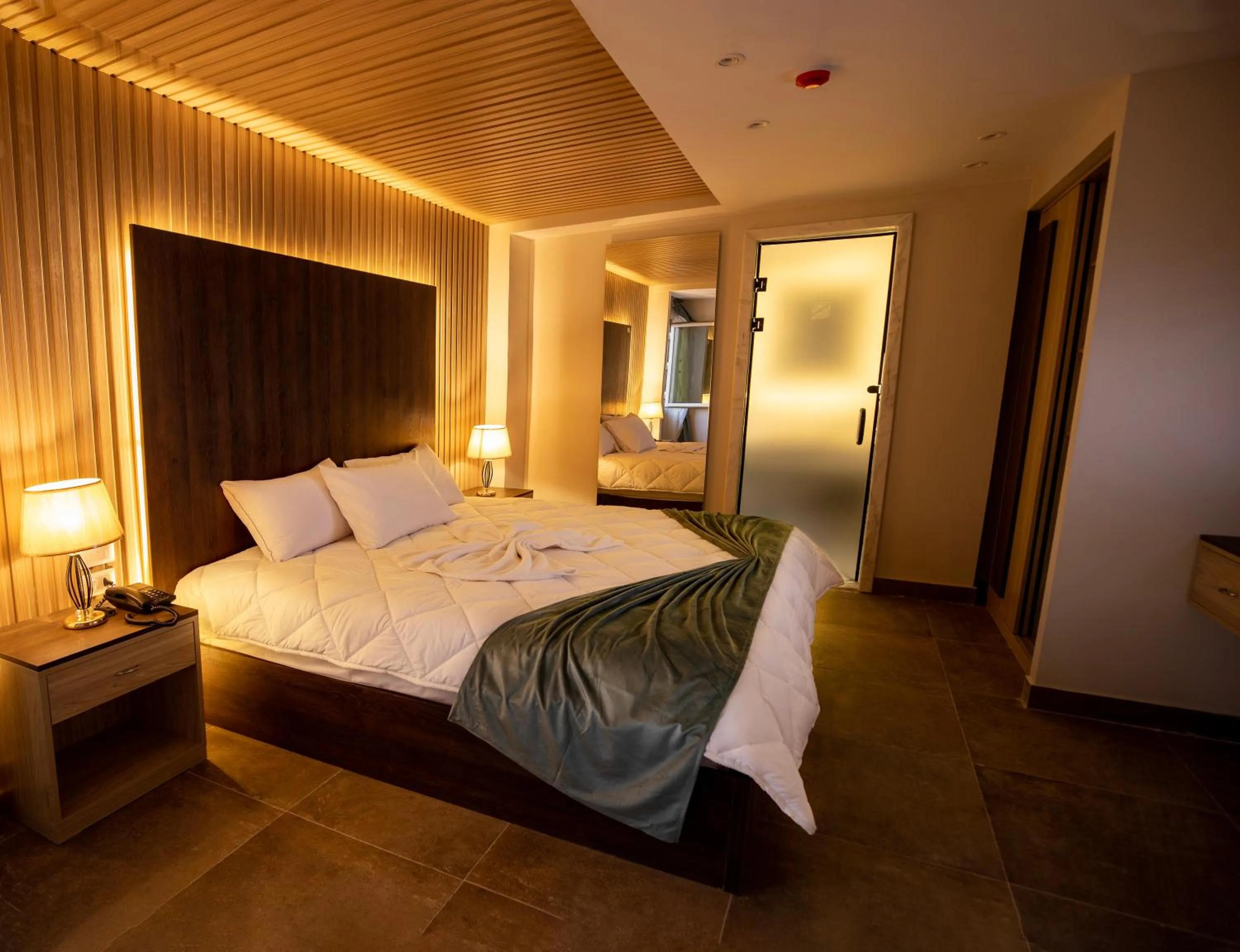 Bed in Blue Pyramids Eyes Hotel